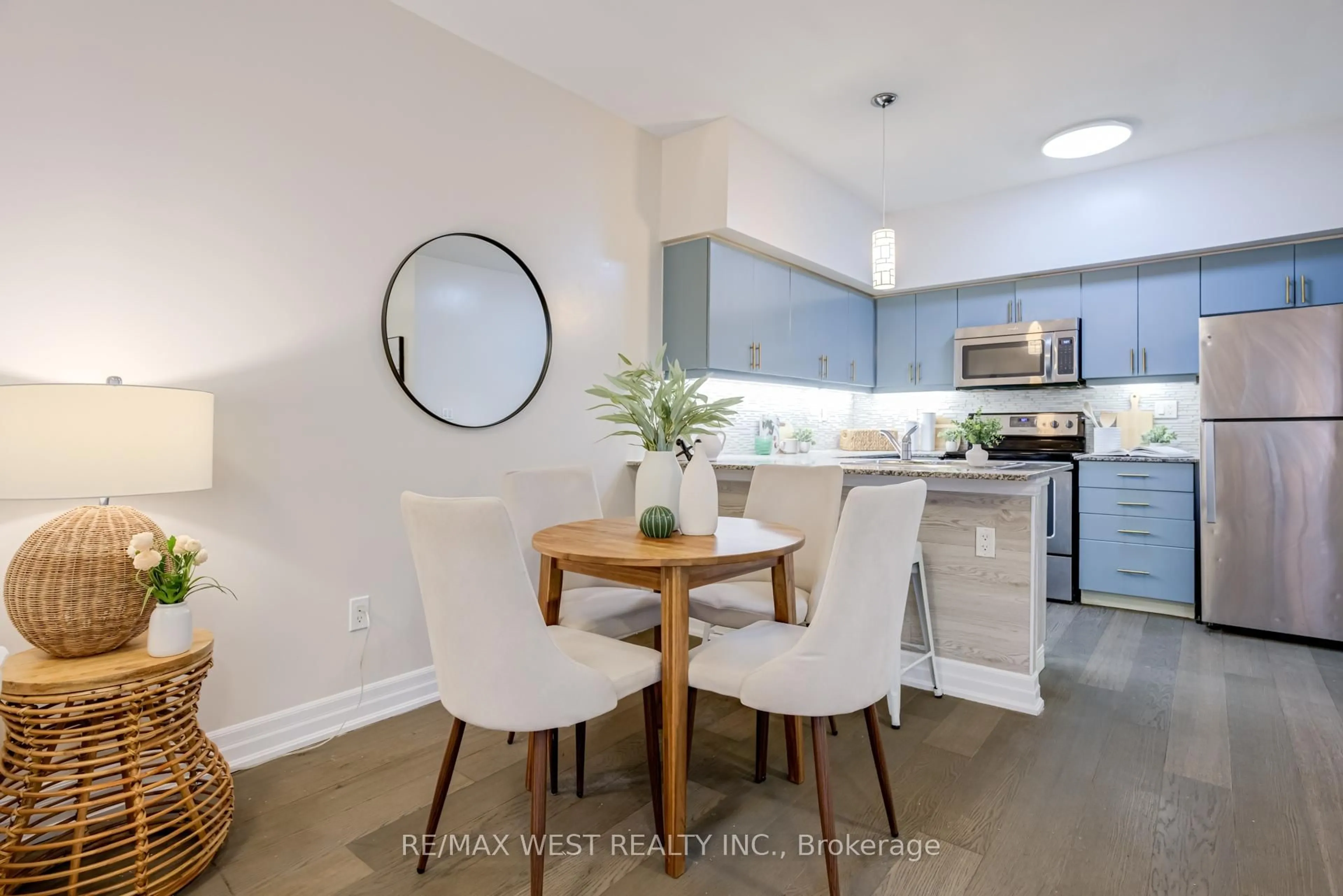 Open concept kitchen, wood/laminate floor for 45 Sousa Mendes St #101, Toronto Ontario M6P 0A7