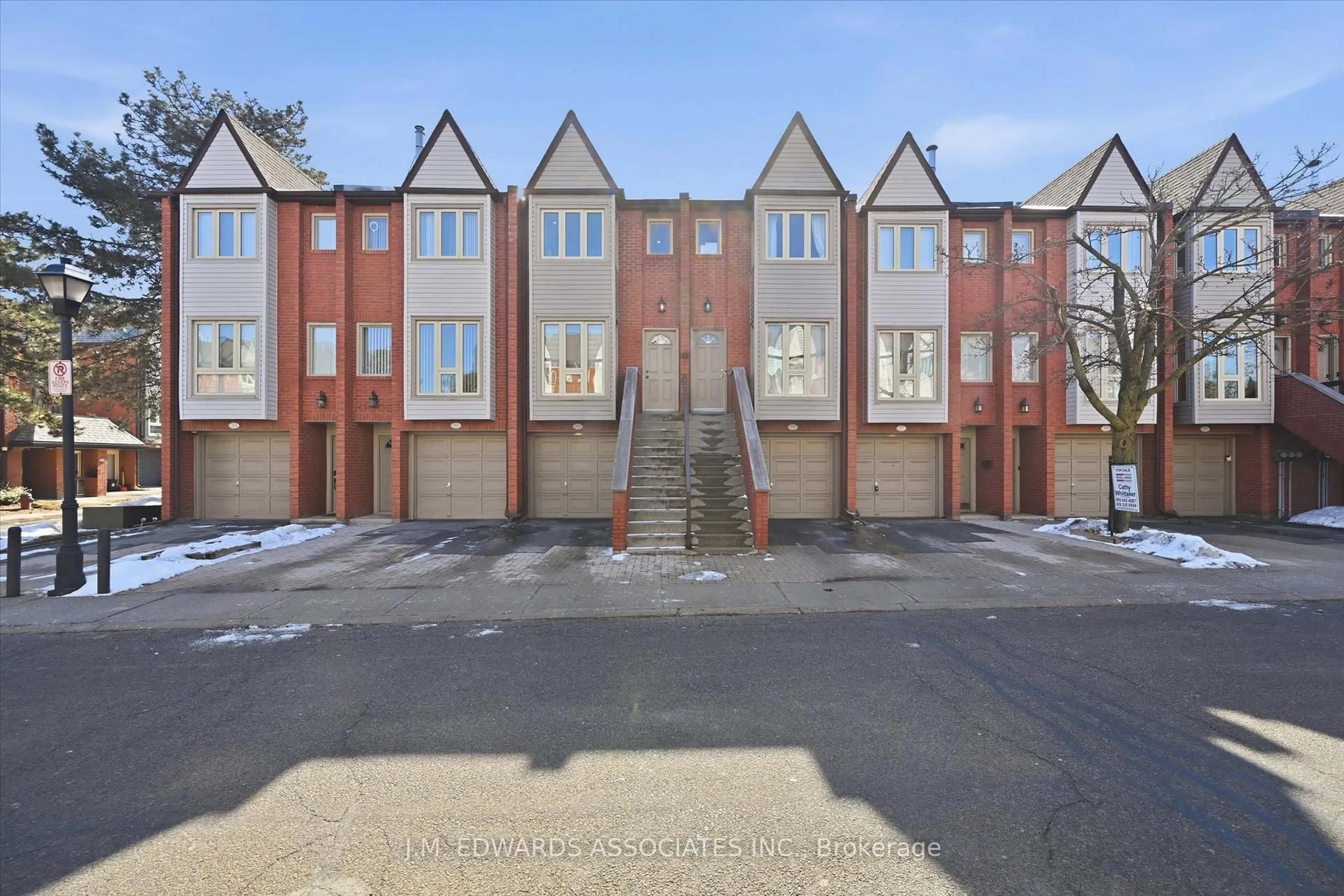 A pic from outside/outdoor area/front of a property/back of a property/a pic from drone, street for 895 Maple Ave #215, Burlington Ontario L7S 2H7