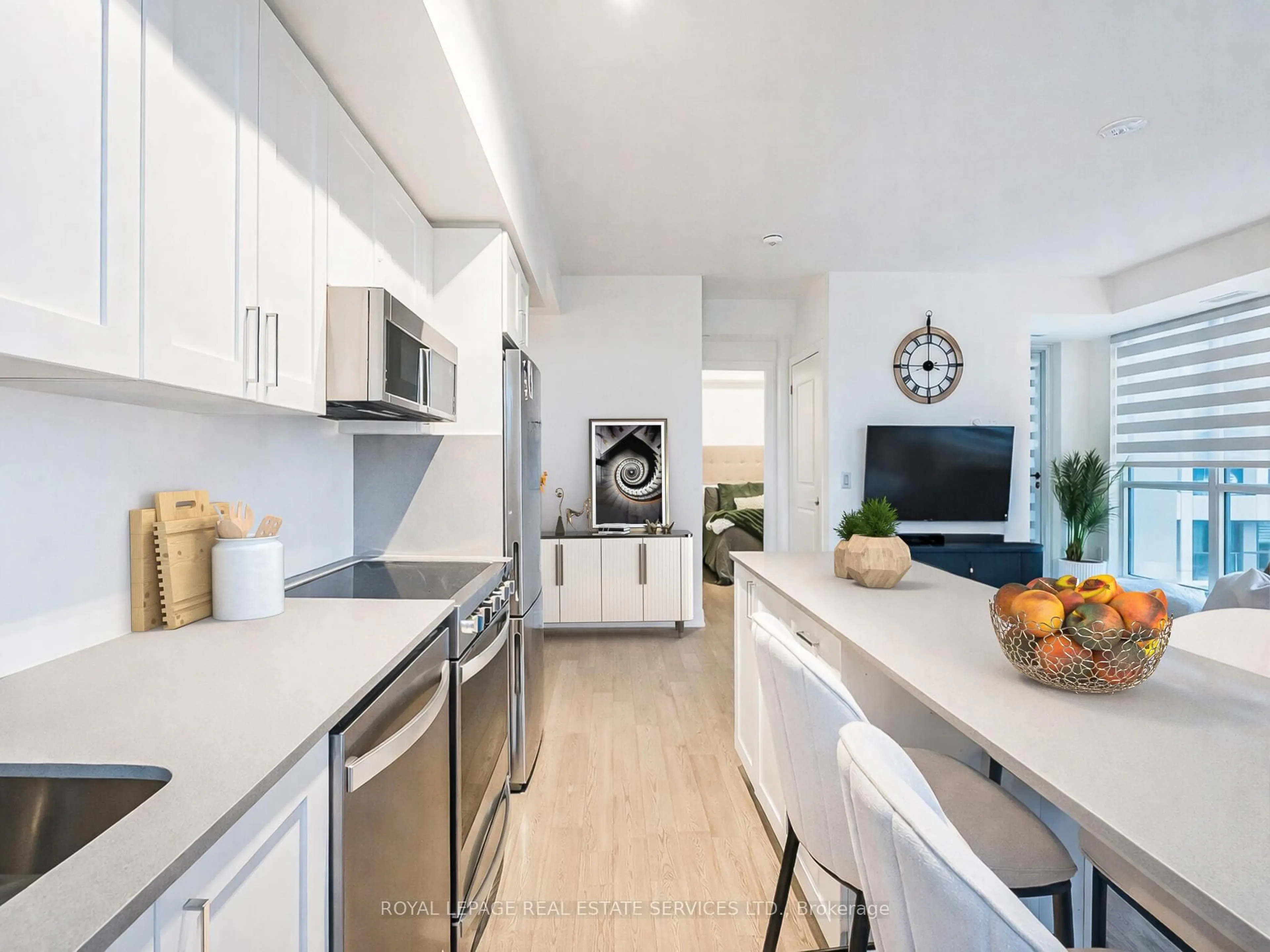 Open concept kitchen, unknown for 1063 Douglas McCurdy Common #303, Mississauga Ontario L5G 0C5