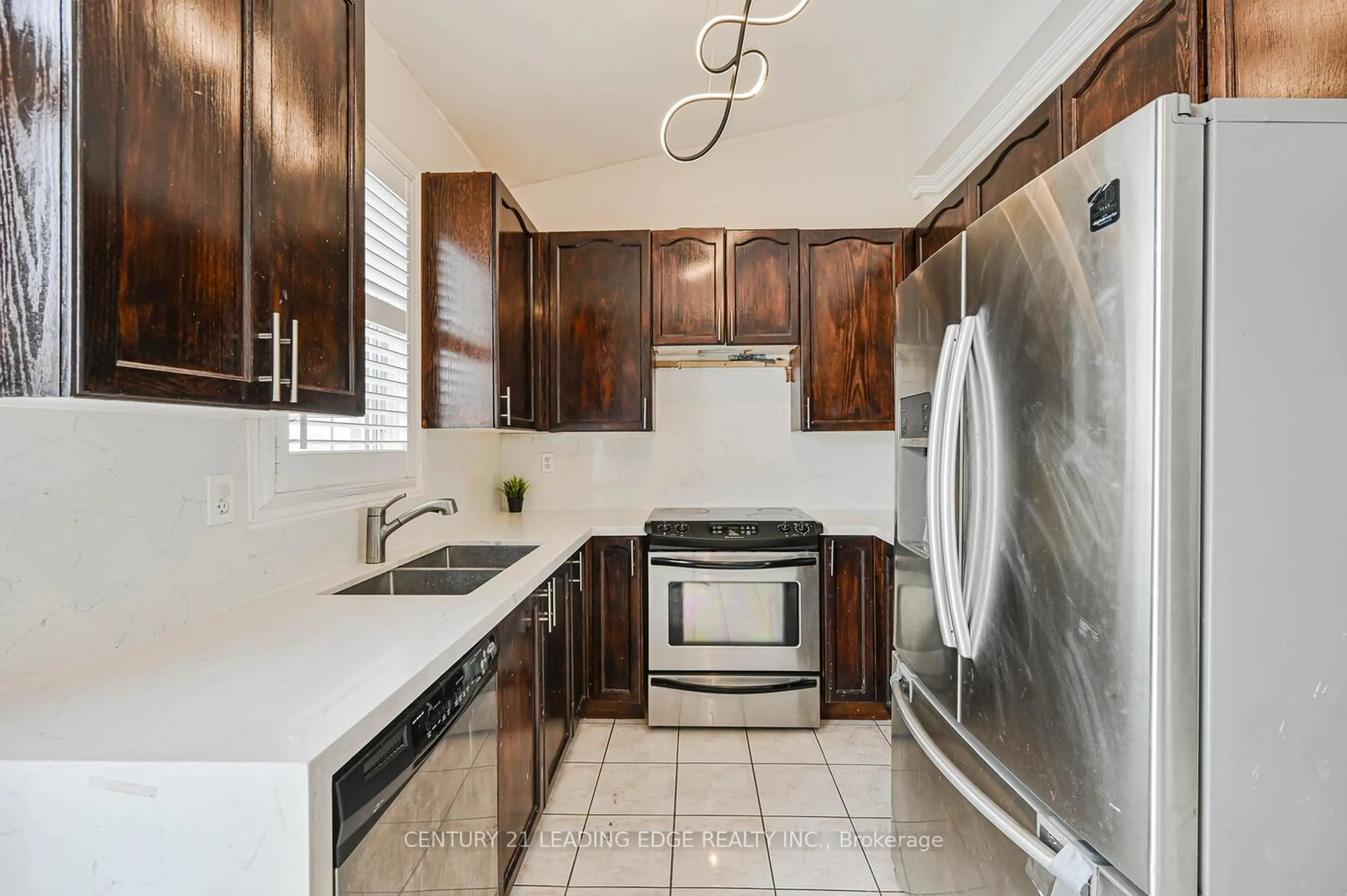 Standard kitchen, ceramic/tile floor for 44 Deepcoral Crt, Brampton Ontario L6V 4P7