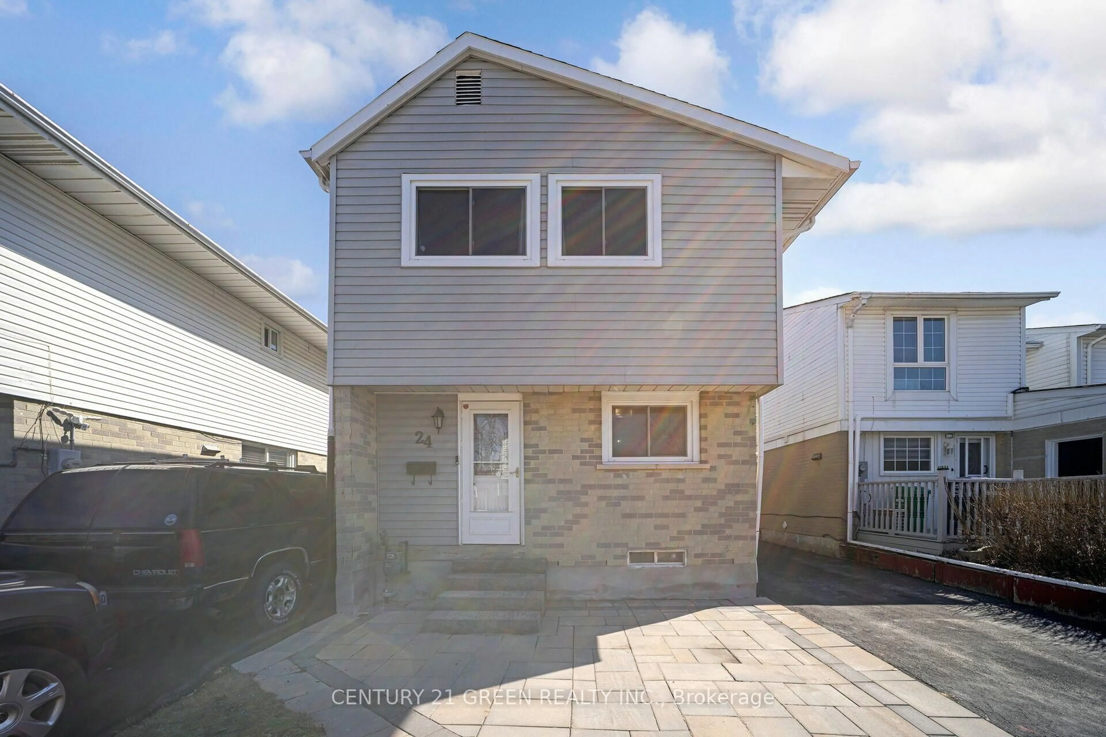 Home with vinyl exterior material, street for 24 Jackman Dr, Brampton Ontario L6S 2L7