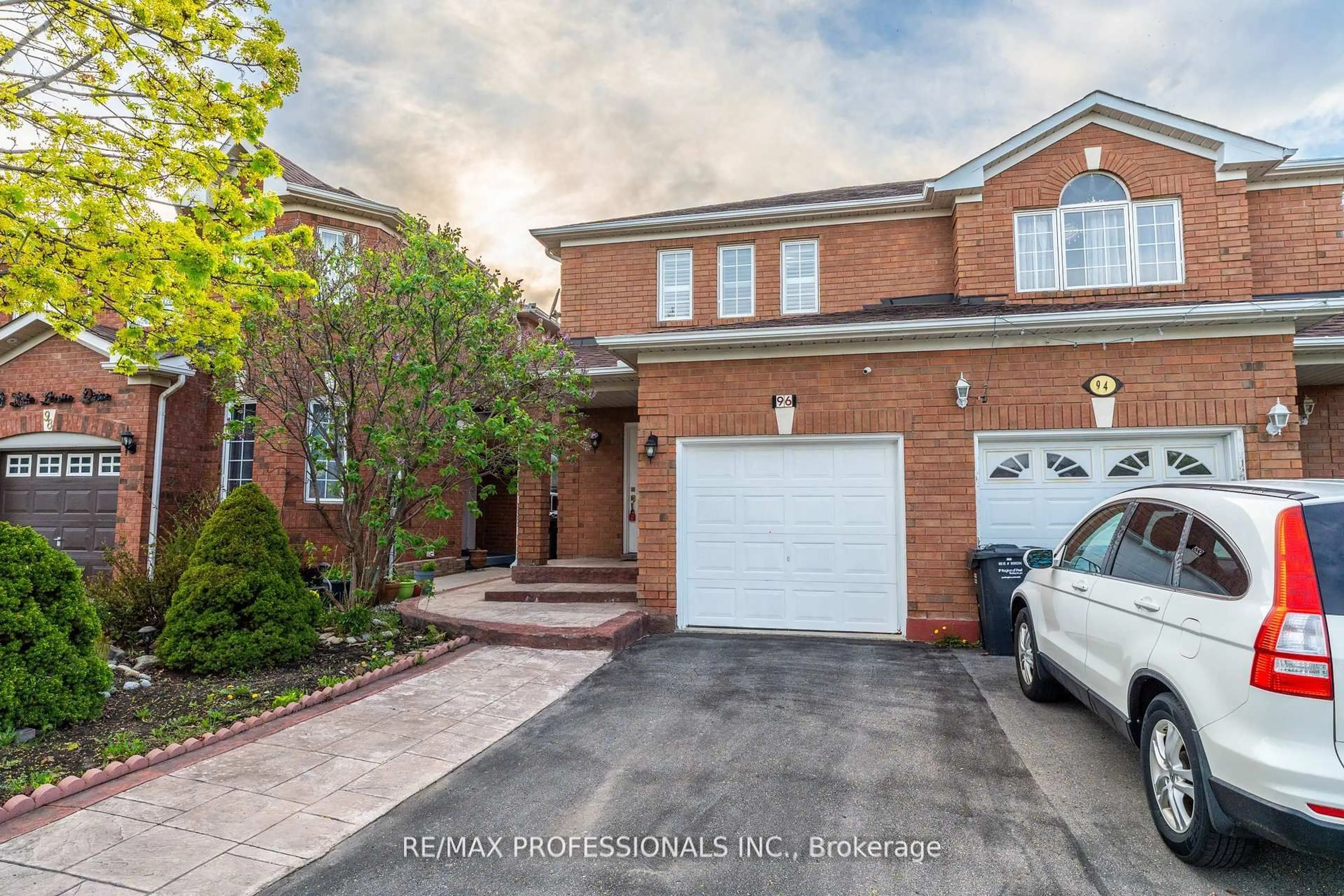 Home with brick exterior material, street for 96 Lake Louise Dr, Brampton Ontario L6X 4Y6