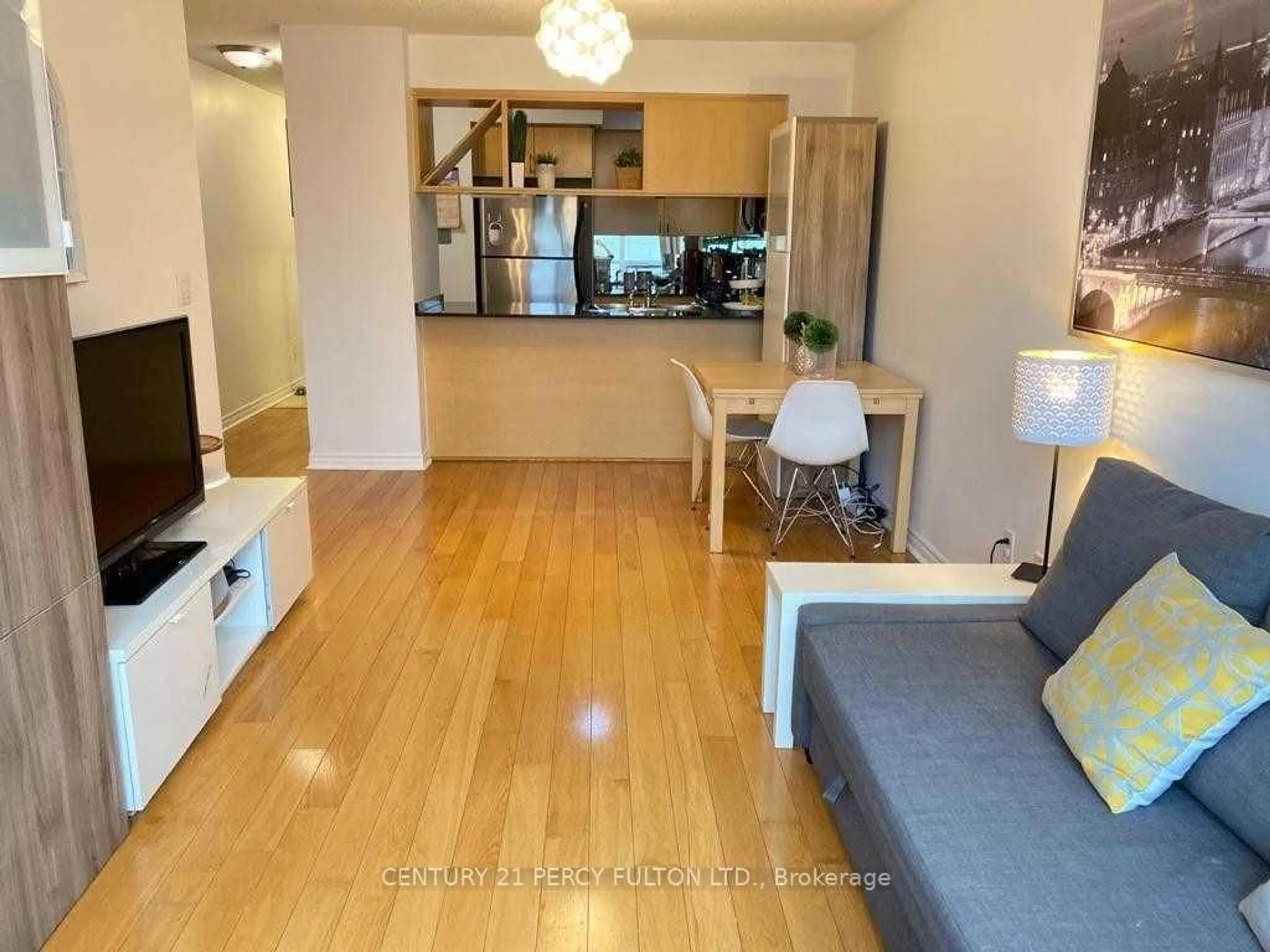 Living room with furniture, wood/laminate floor for 4080 Living Arts Dr #302, Mississauga Ontario L5B 4N3