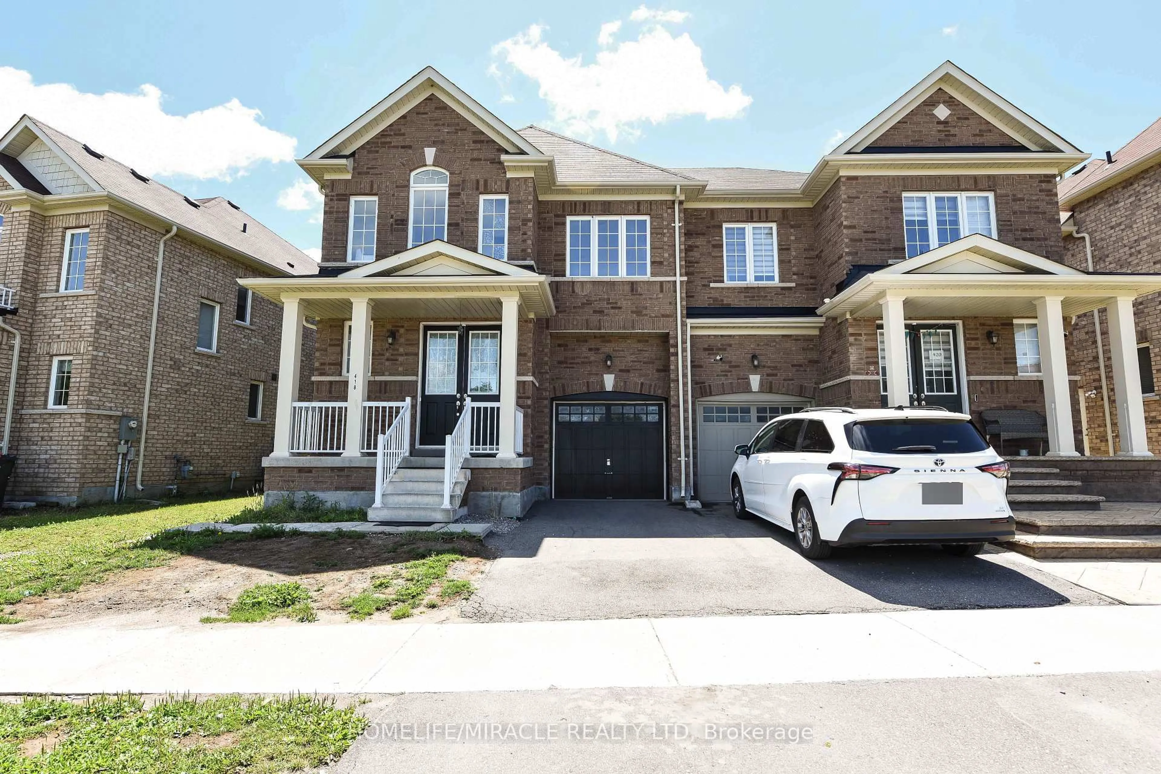Home with brick exterior material, street for 418 Royal West Dr, Brampton Ontario L6X 5K1