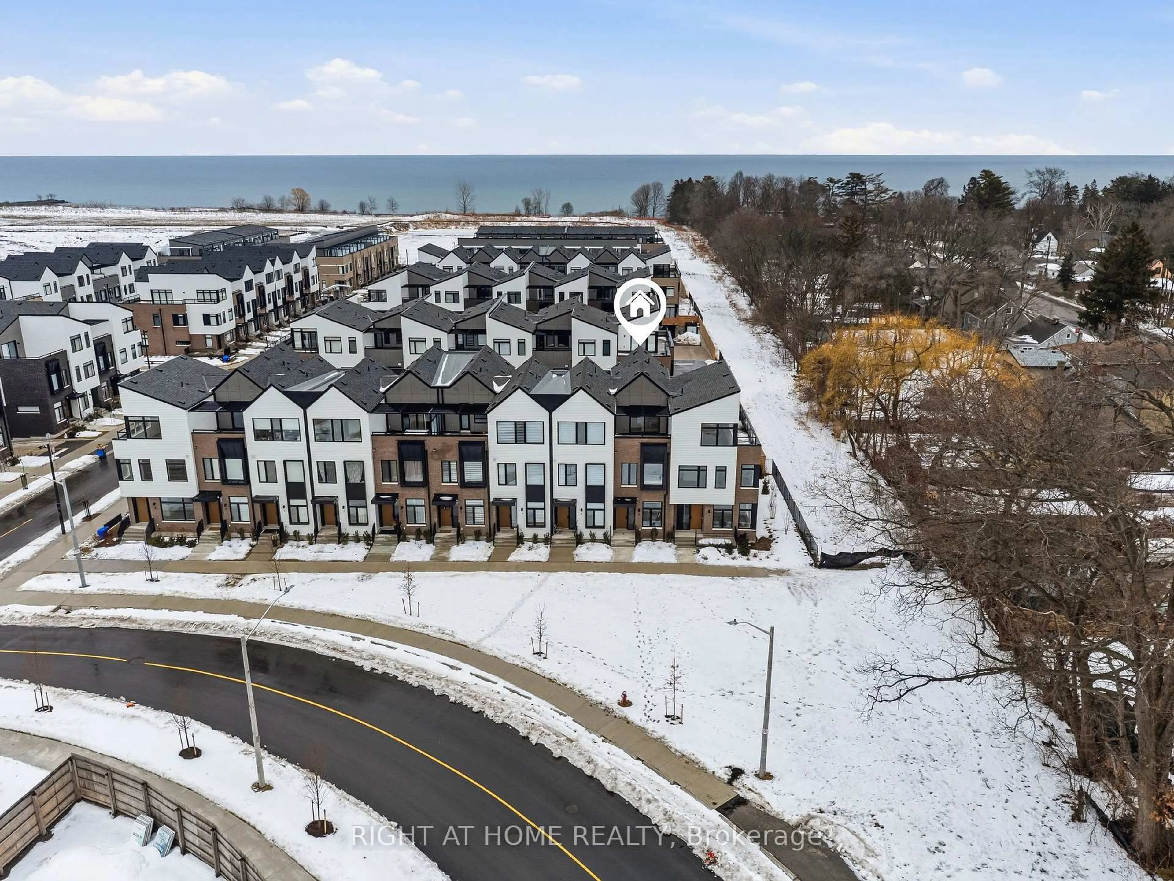 A pic from outside/outdoor area/front of a property/back of a property/a pic from drone, water/lake/river/ocean view for 10 Lou Parsons Way #2, Mississauga Ontario L5H 0B2