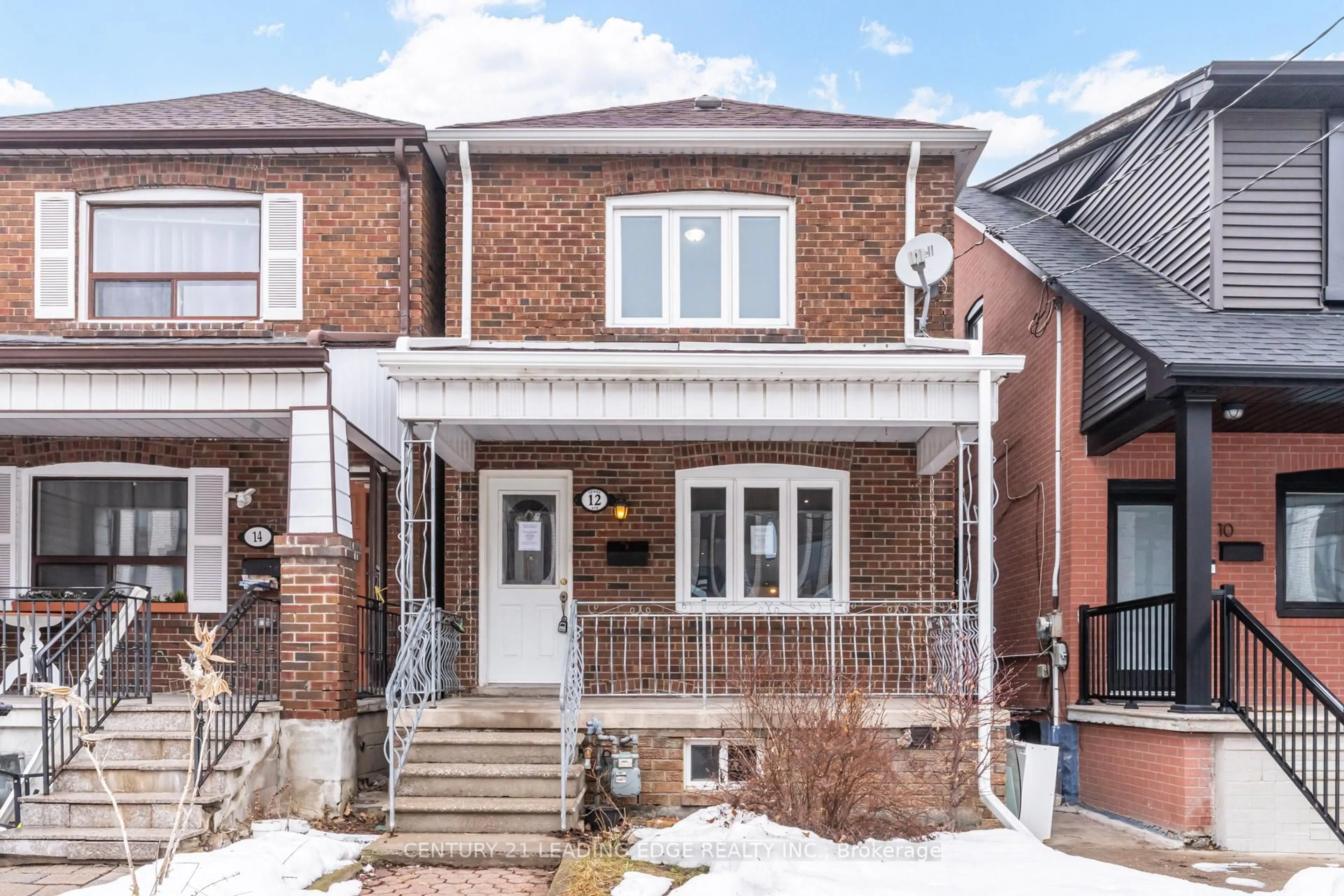 Home with brick exterior material, street for 12 Innes Ave, Toronto Ontario M6E 1M8