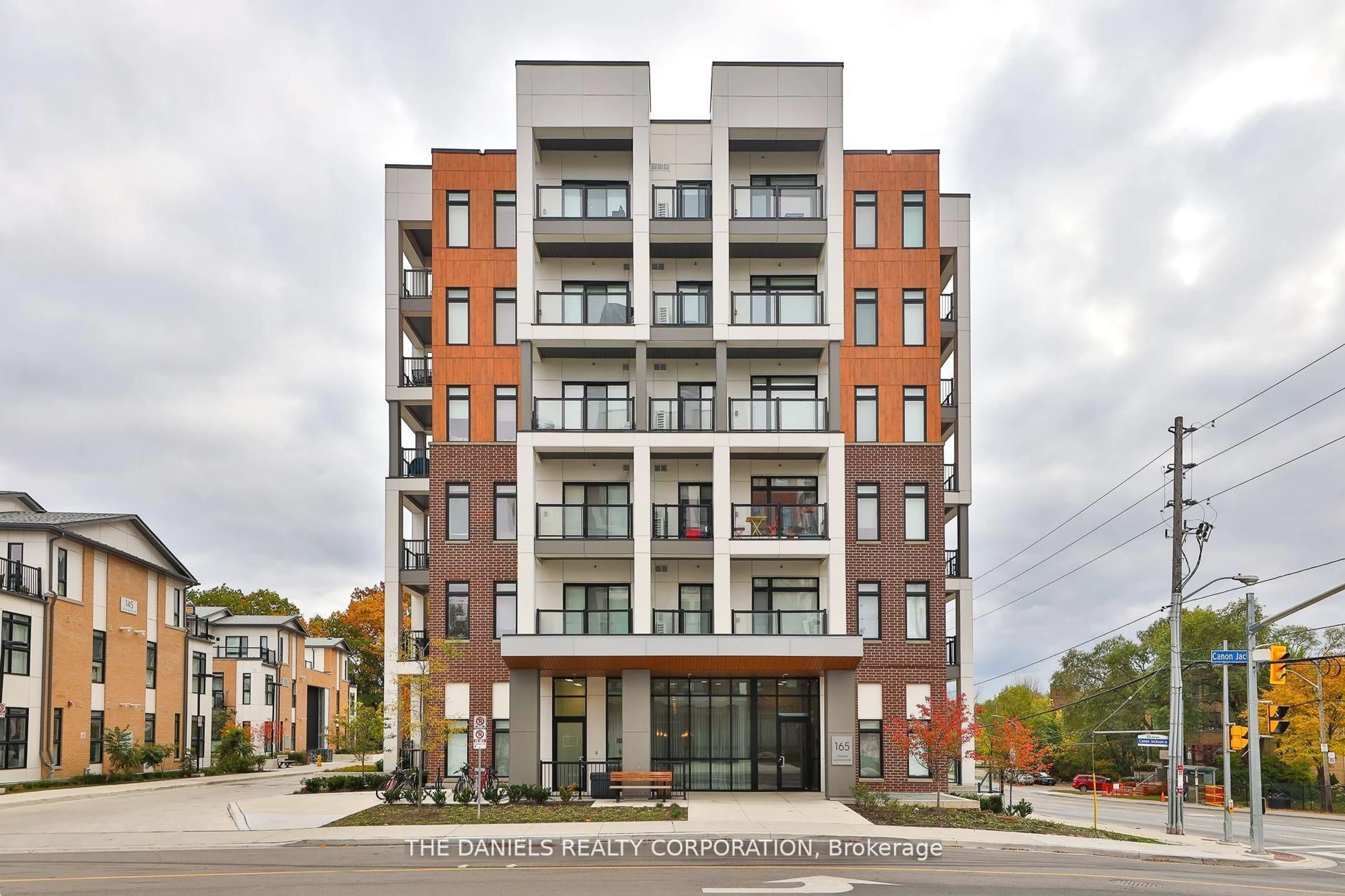 Home with brick exterior material, building for 165 Canon Jackson Dr #210, Toronto Ontario M6M 0C4