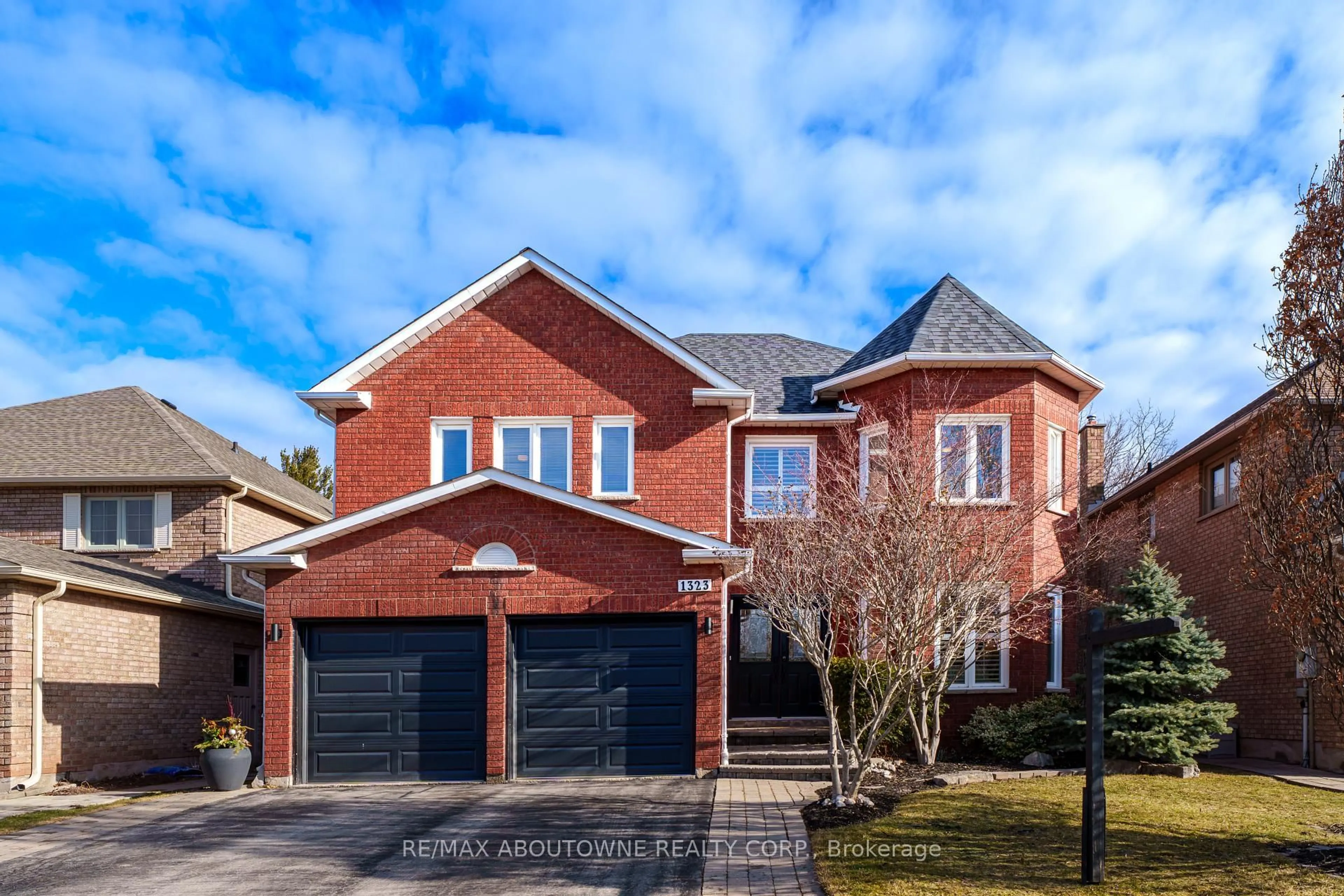 Home with brick exterior material, street for 1323 Blackburn Dr, Oakville Ontario L6M 2X9