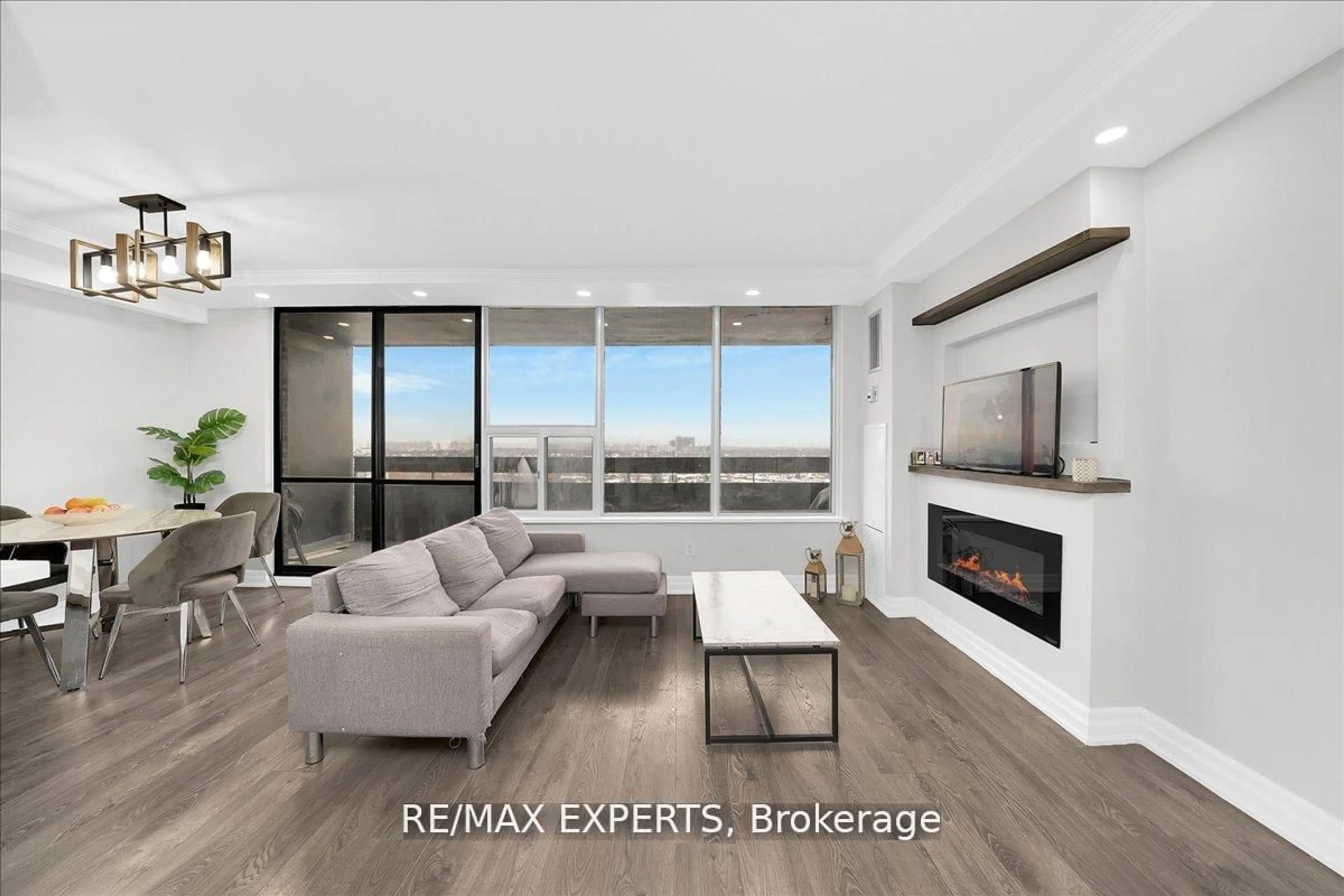 Living room with furniture, unknown for 11 Wincott Dr #2115, Toronto Ontario M9R 2R9