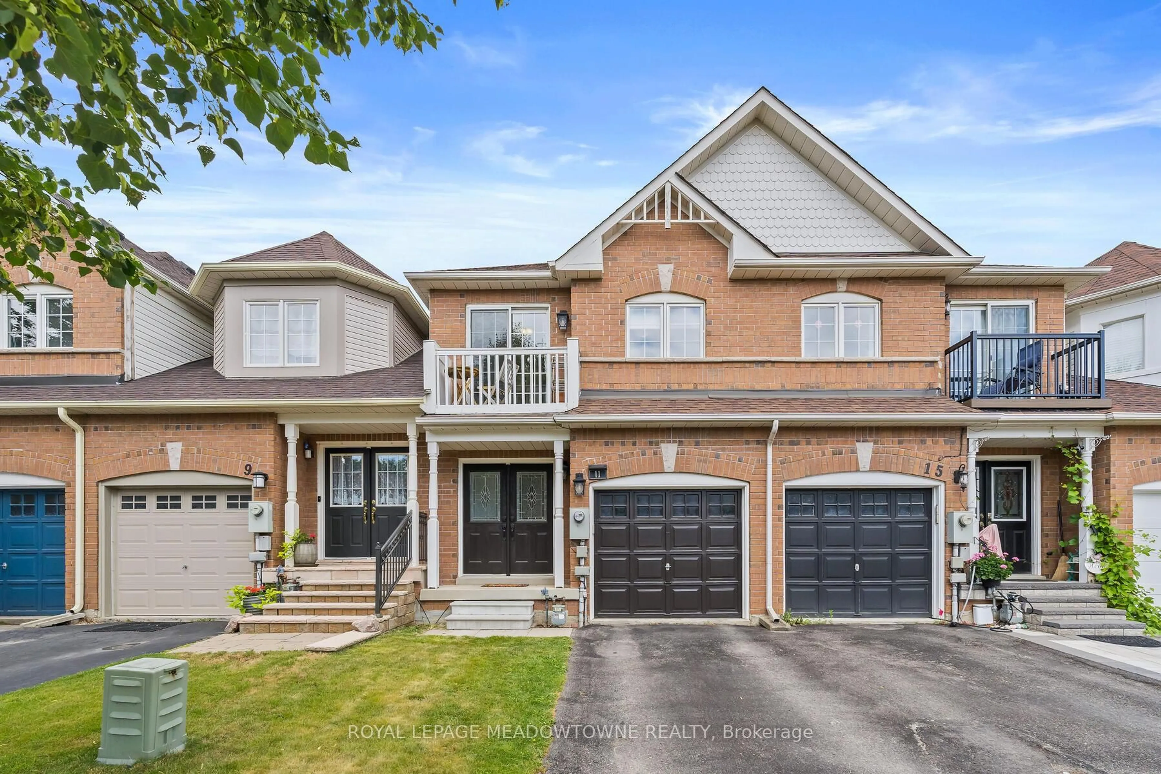 Home with brick exterior material, street for 11 Bradley Dr, Halton Hills Ontario L7G 6B5