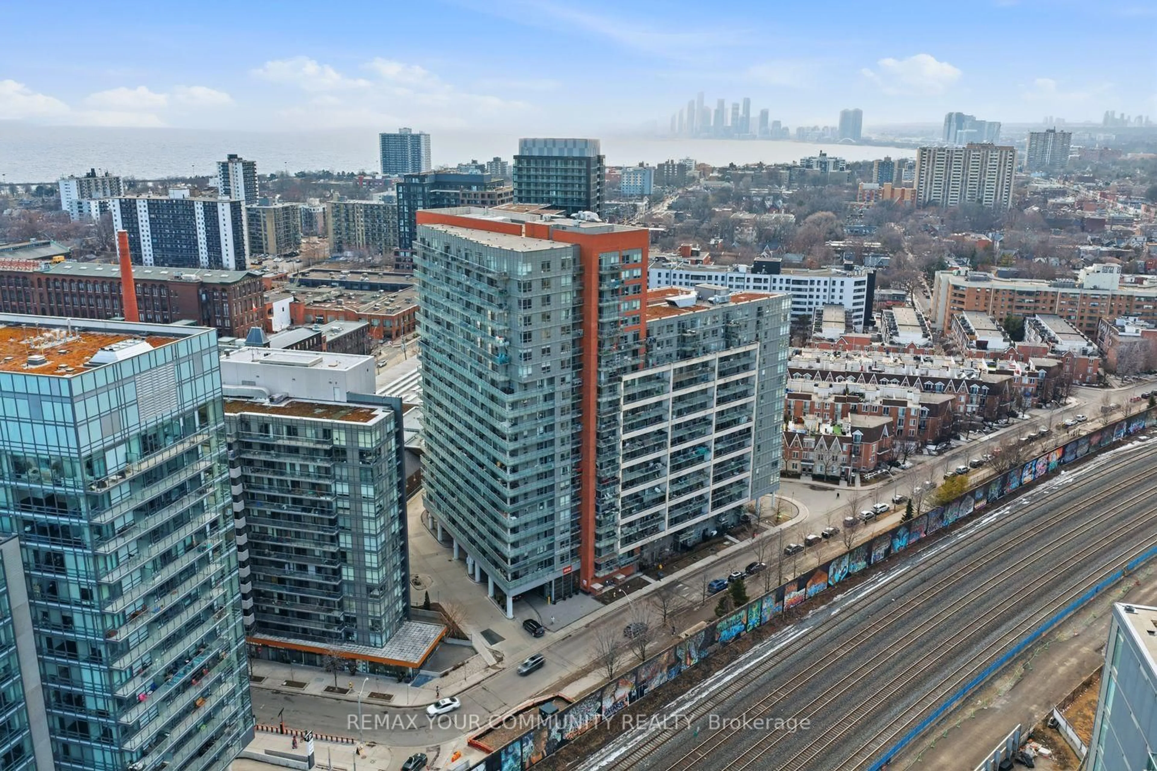 A pic from outside/outdoor area/front of a property/back of a property/a pic from drone, city buildings view from balcony for 38 Joe Shuster Way #1526, Toronto Ontario M6K 0A5