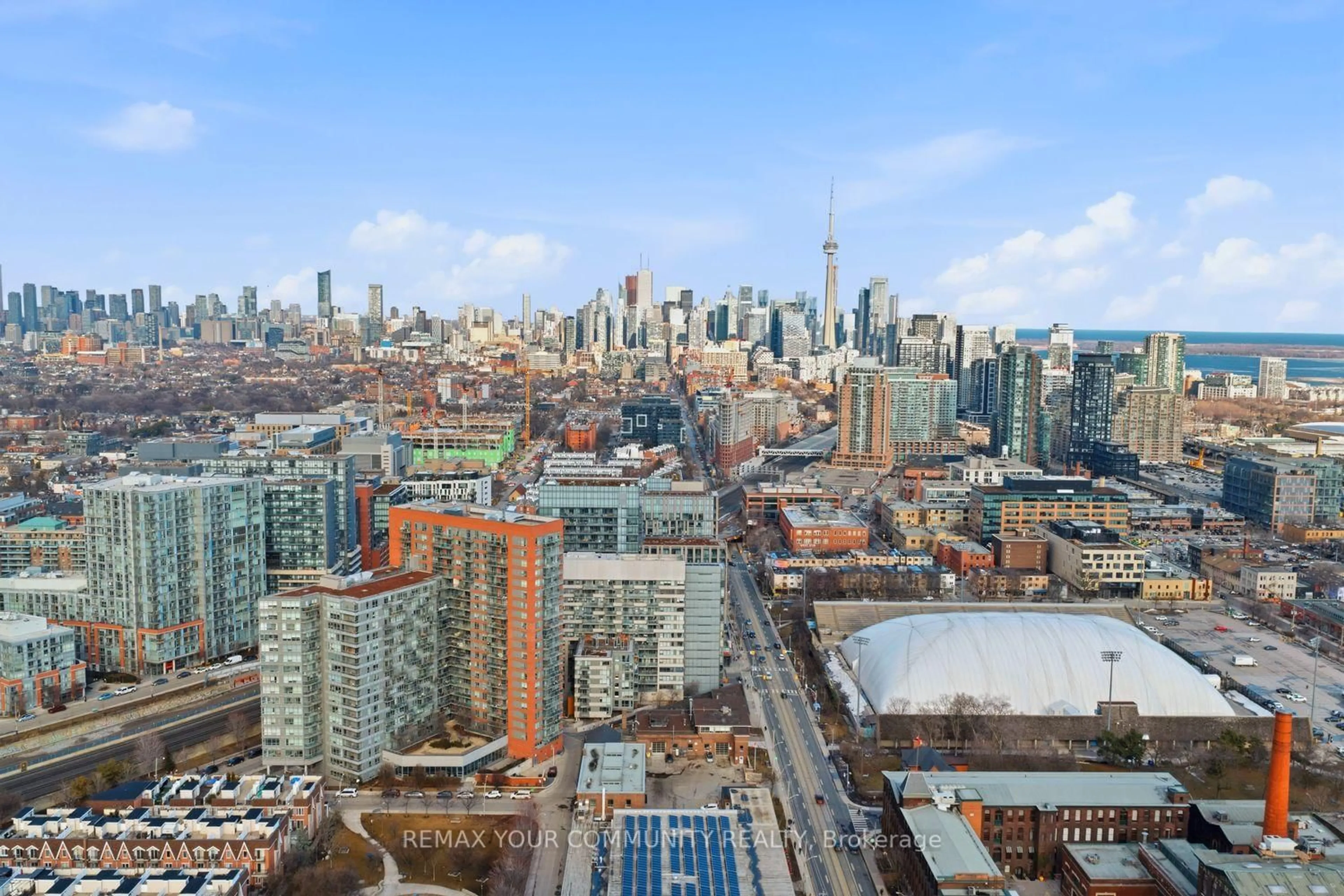 A pic from outside/outdoor area/front of a property/back of a property/a pic from drone, city buildings view from balcony for 38 Joe Shuster Way #1526, Toronto Ontario M6K 0A5