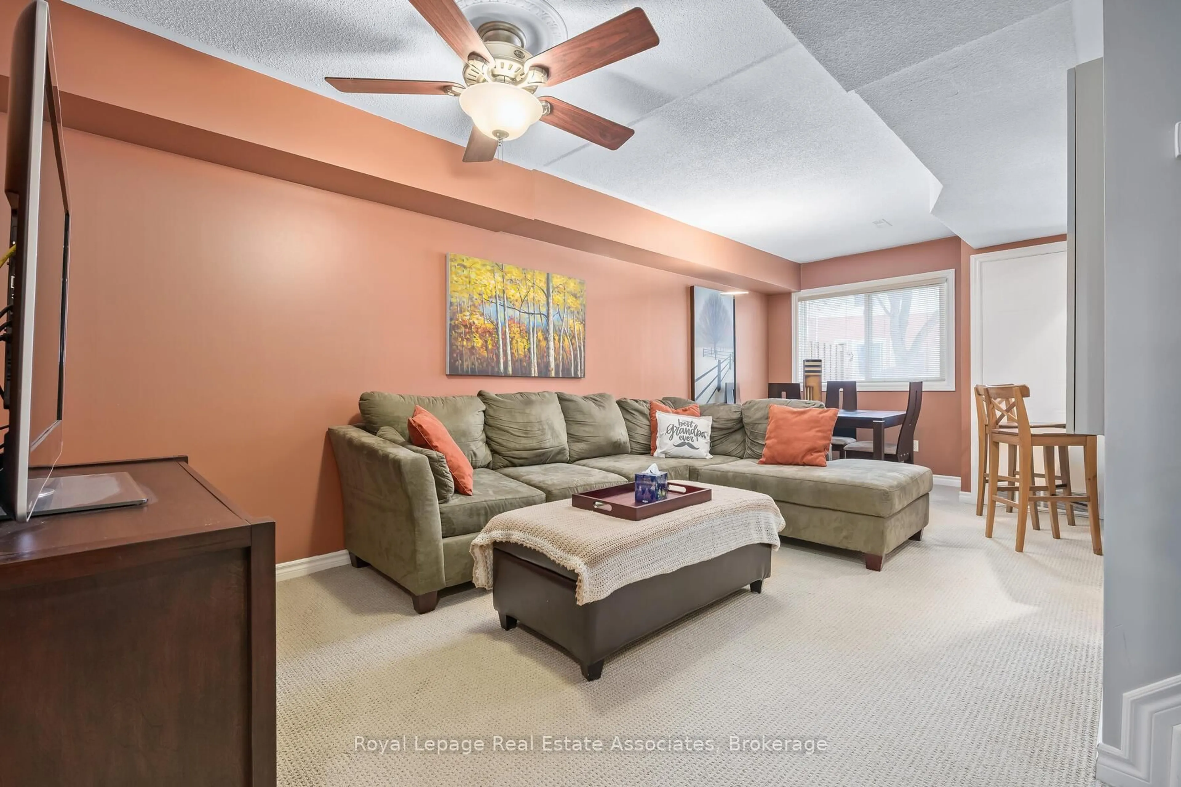 Living room with furniture, ceramic/tile floor for 62 Stewart Maclaren Rd #60, Halton Hills Ontario L7G 5L9