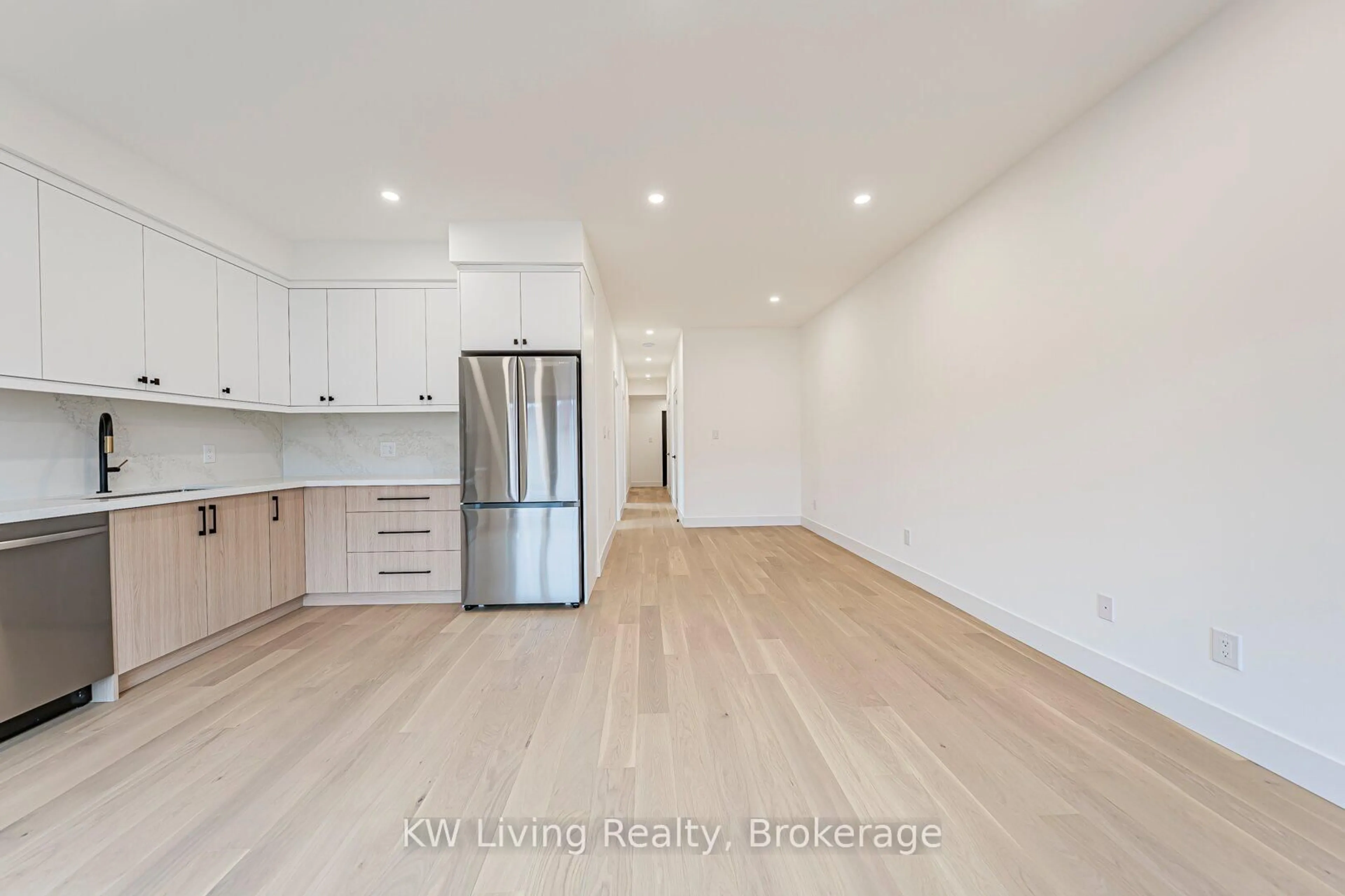 Open concept kitchen, wood/laminate floor for 14 Holmesdale Rd, Toronto Ontario M6E 1Y1