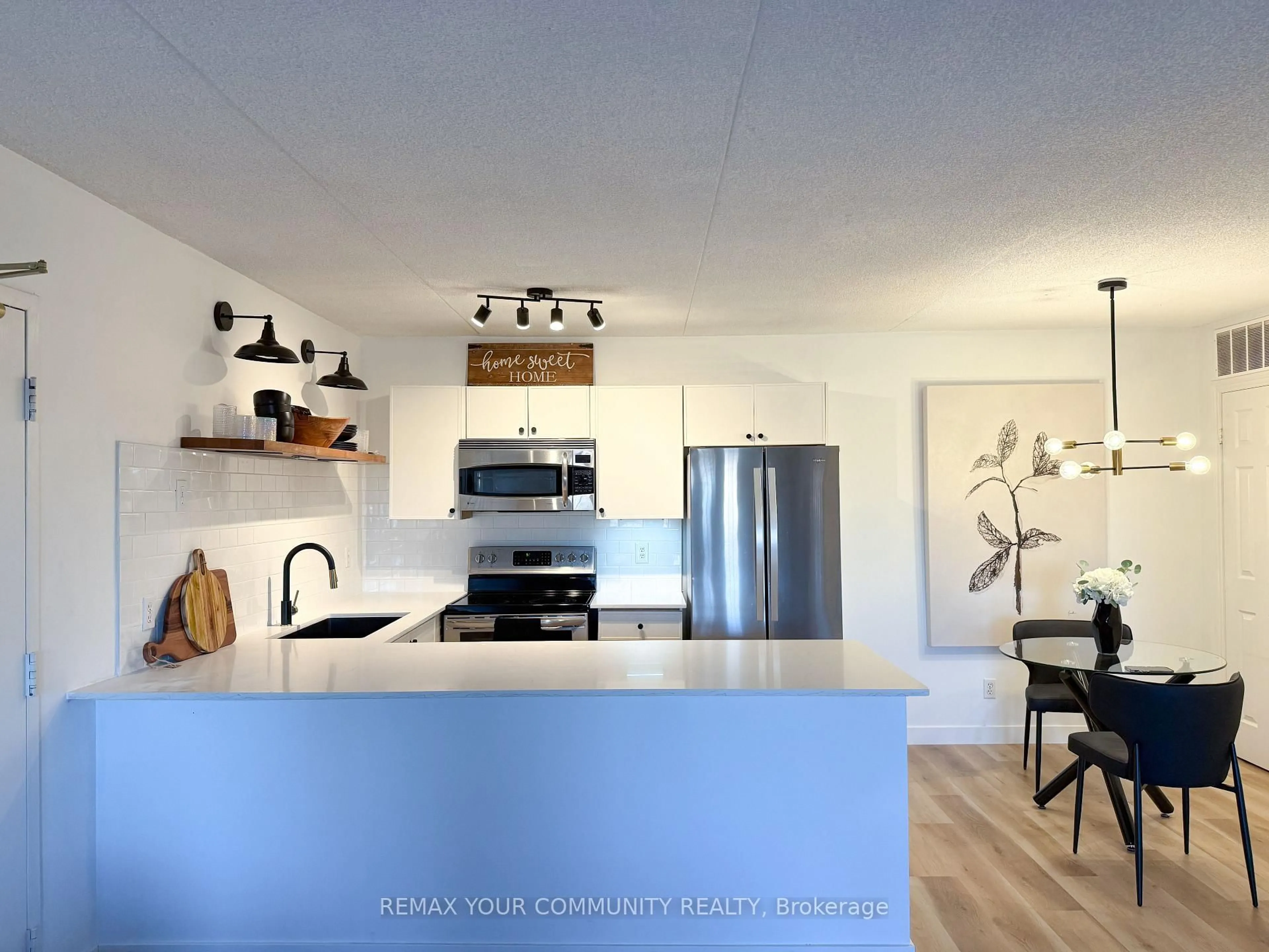 Open concept kitchen, unknown for 1800 Walker's Line #210, Burlington Ontario L7M 4V2