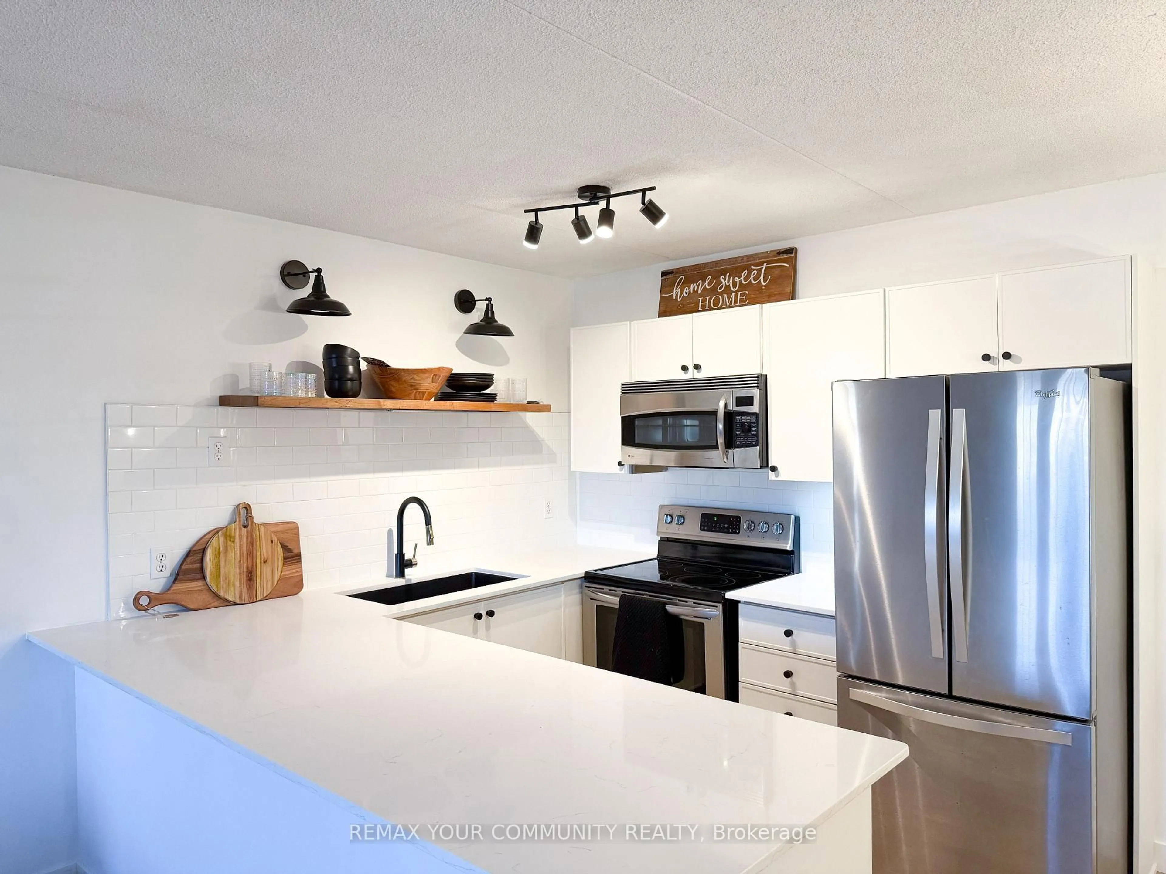 Open concept kitchen, unknown for 1800 Walker's Line #210, Burlington Ontario L7M 4V2