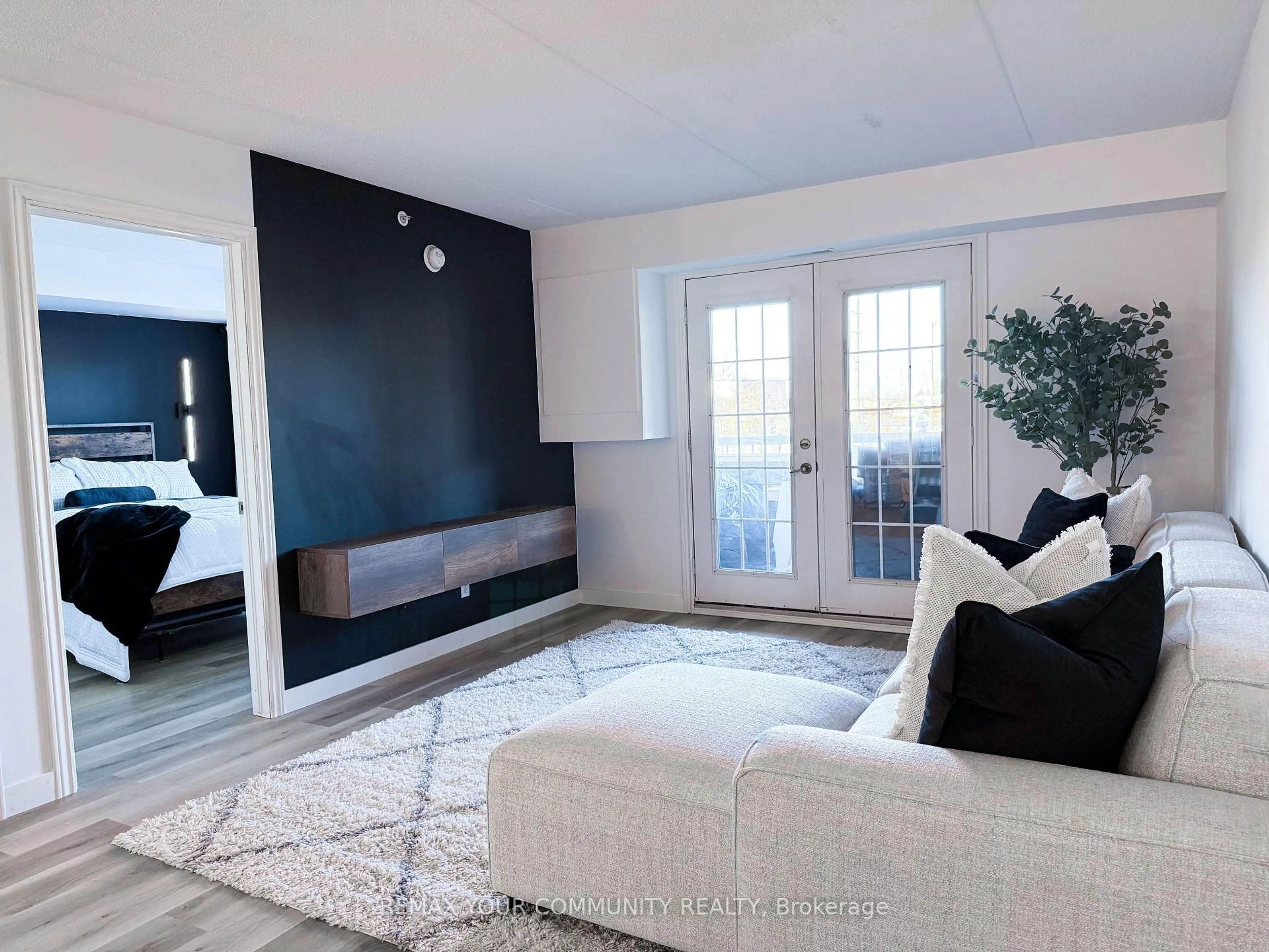 Living room with furniture, unknown for 1800 Walker's Line #210, Burlington Ontario L7M 4V2