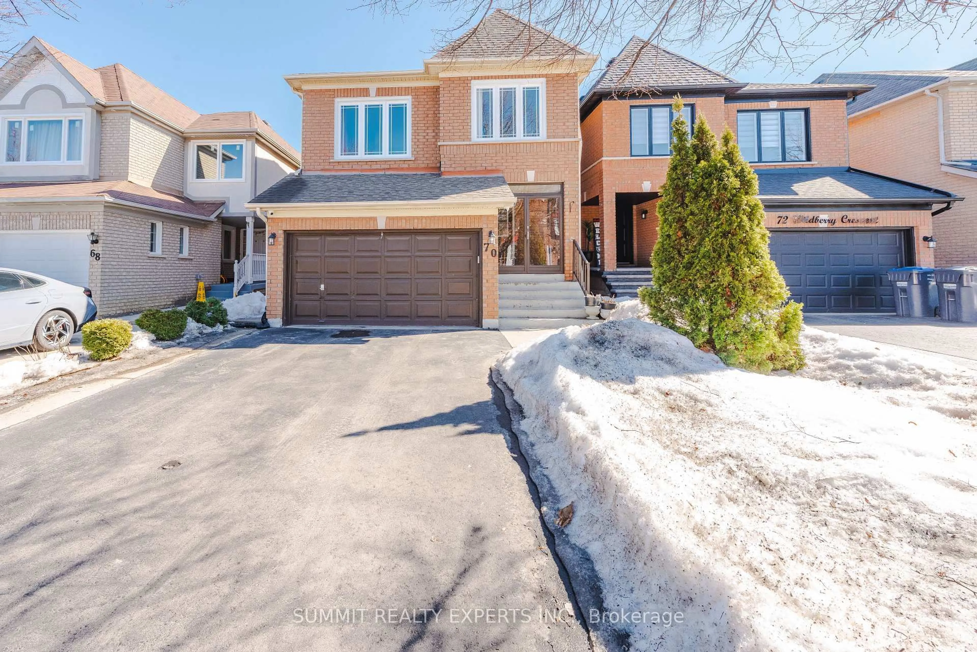 Home with brick exterior material, street for 70 Wildberry Cres, Brampton Ontario L6R 1J9