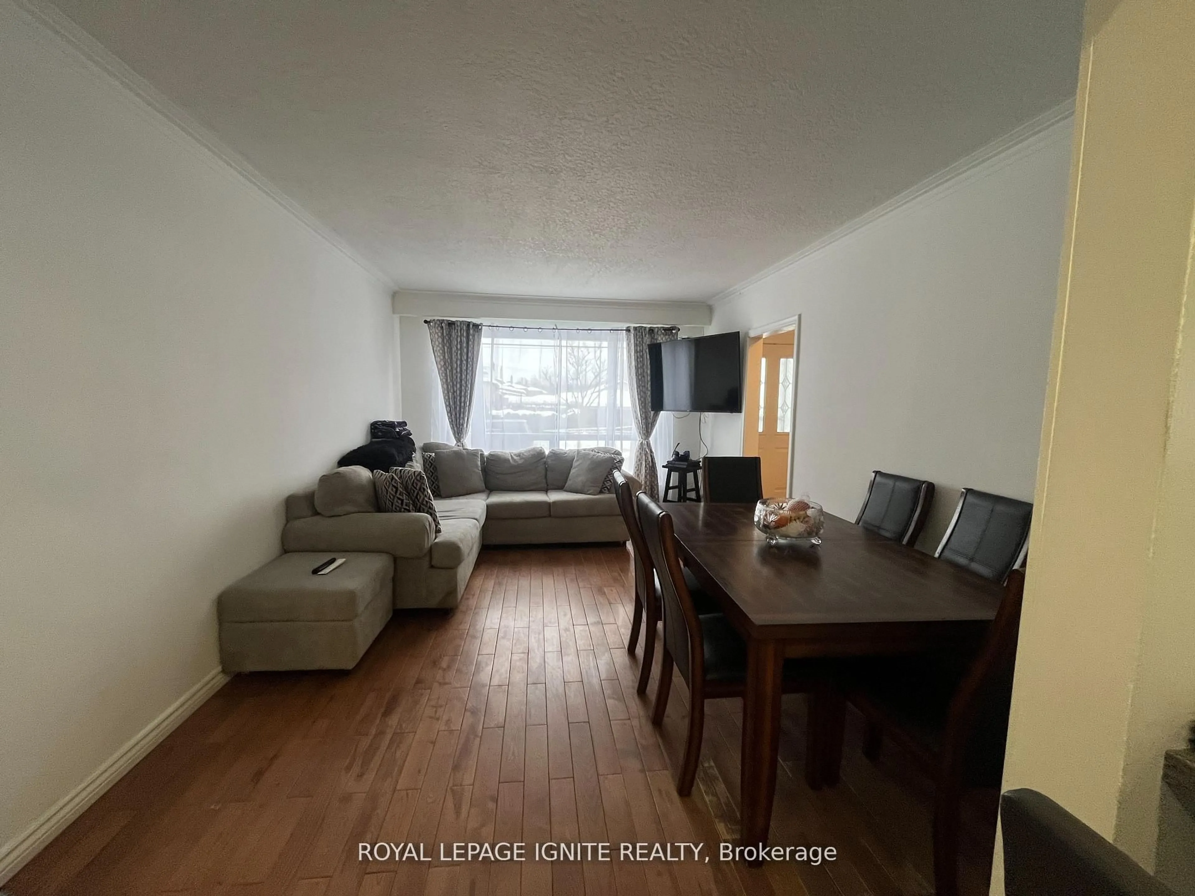 Living room with furniture, wood/laminate floor for 55 Dalrymple Dr, Toronto Ontario M6N 4S2