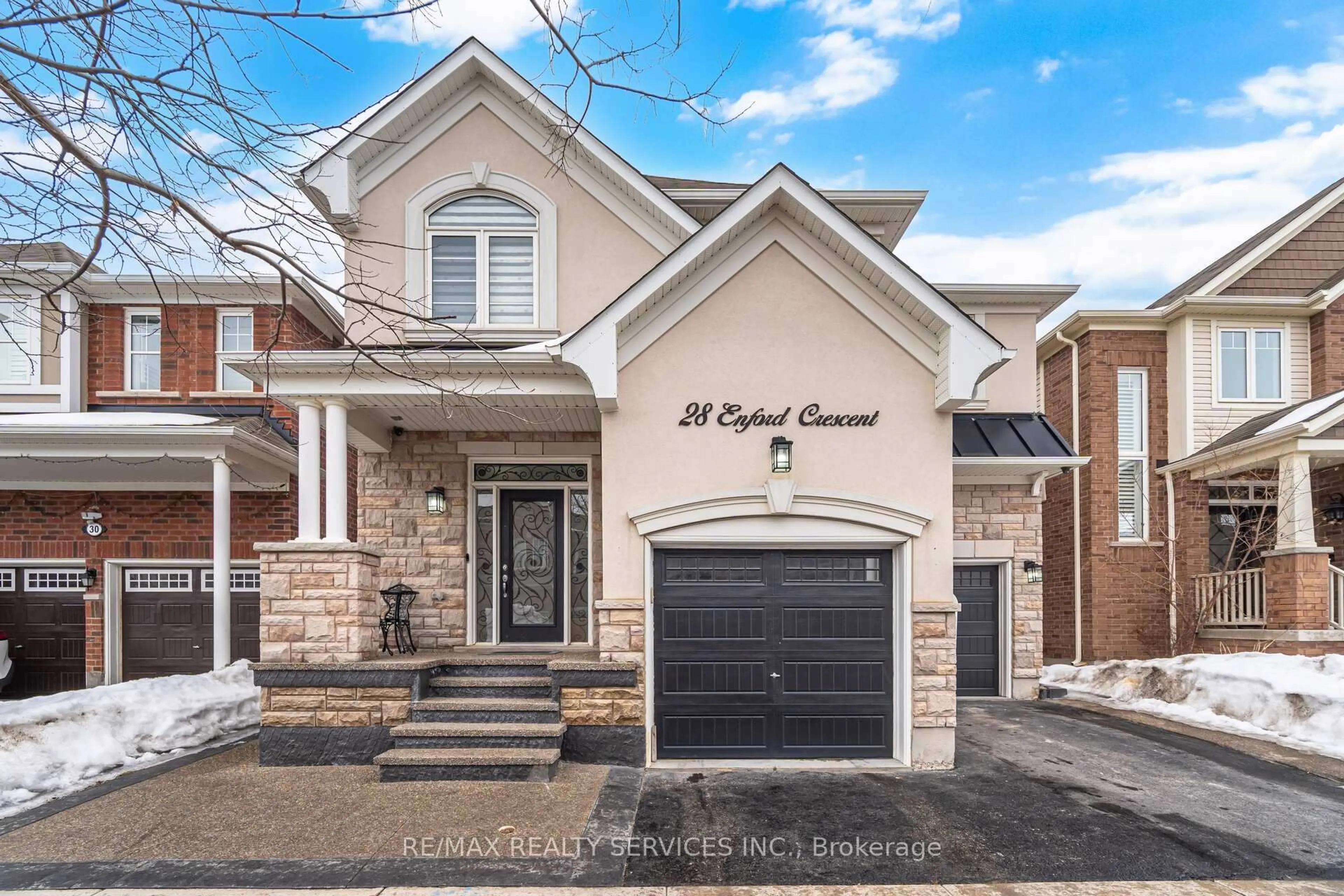 Home with brick exterior material, street for 28 Enford Cres, Brampton Ontario L7A 4C7