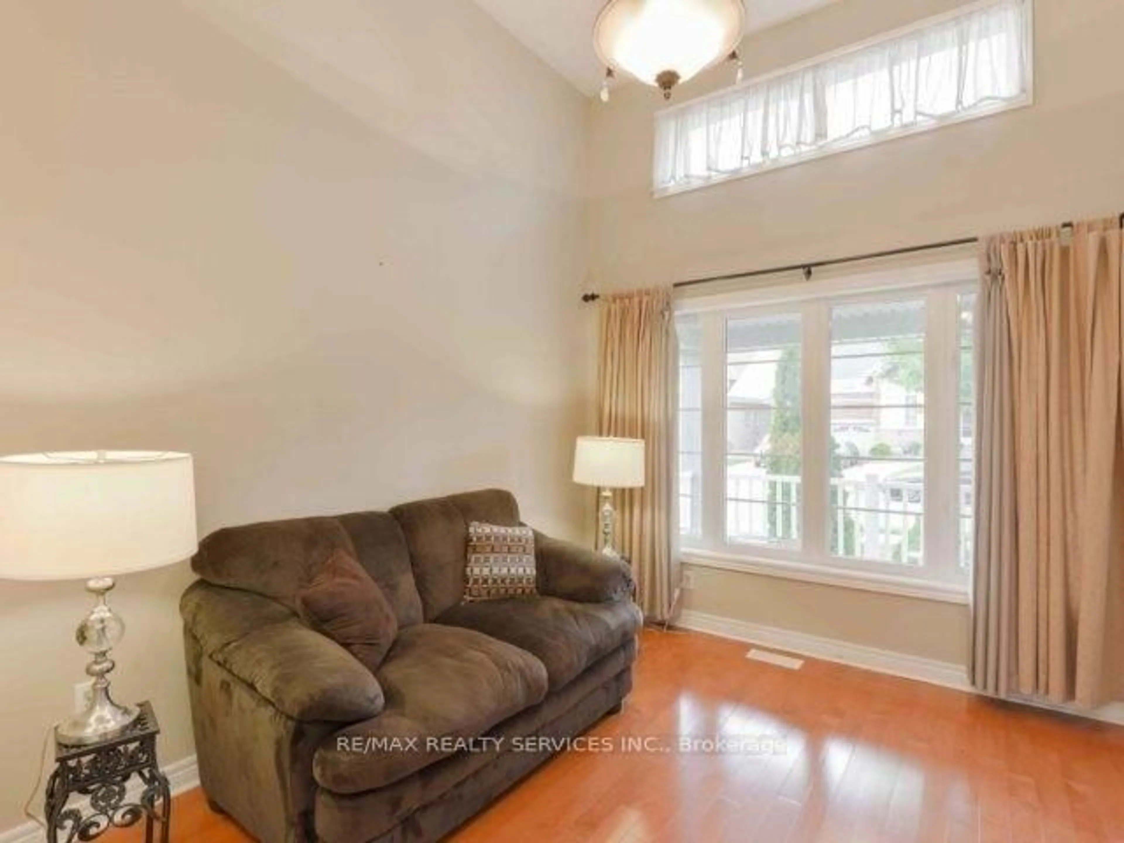Living room with furniture, unknown for 106 Pennyroyal Cres, Brampton Ontario L6S 6J6