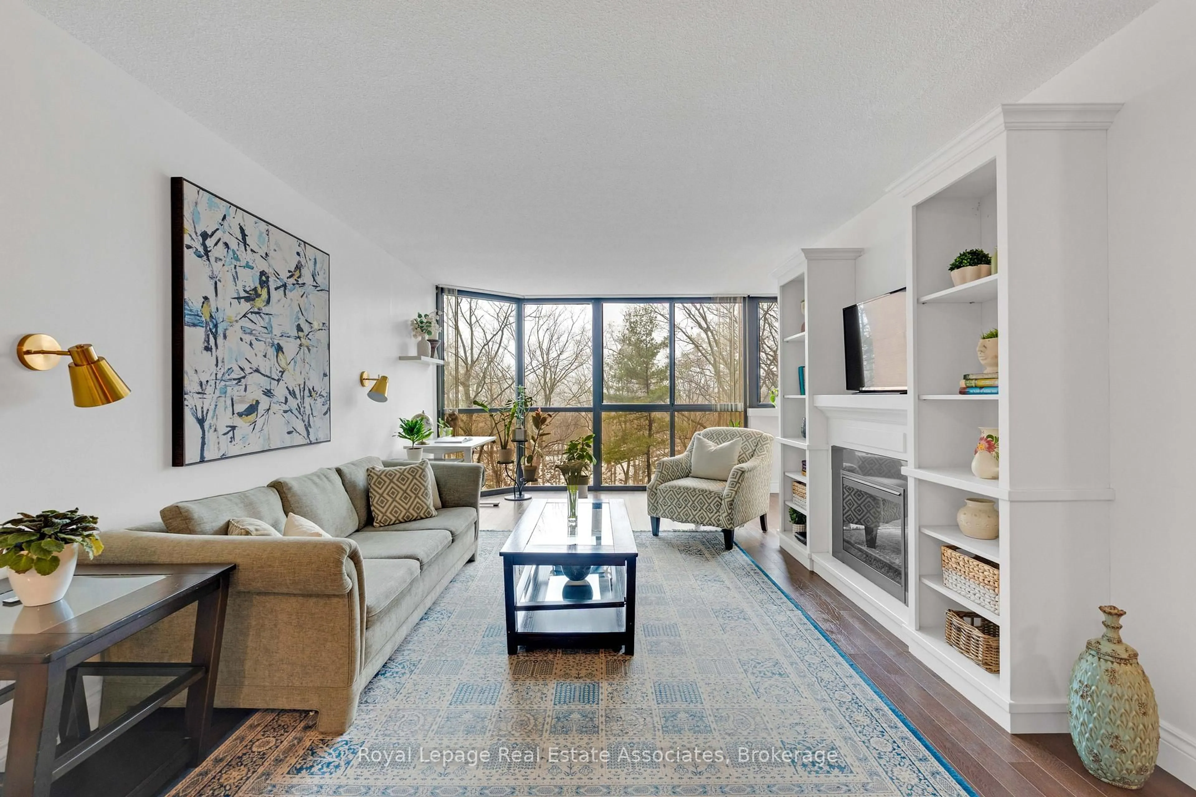 Living room with furniture, unknown for 1240 Marlborough Crt #402, Oakville Ontario L6H 3K7