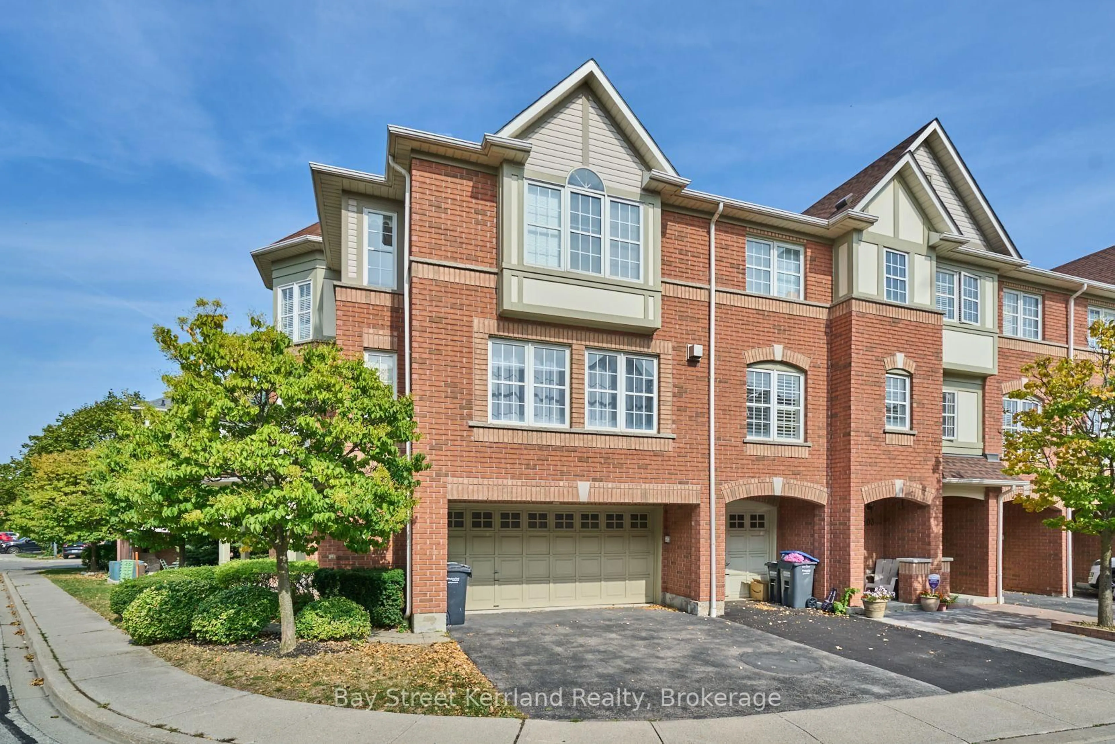 Home with brick exterior material, street for 3030 Breakwater Crt #105, Mississauga Ontario L5B 4N9