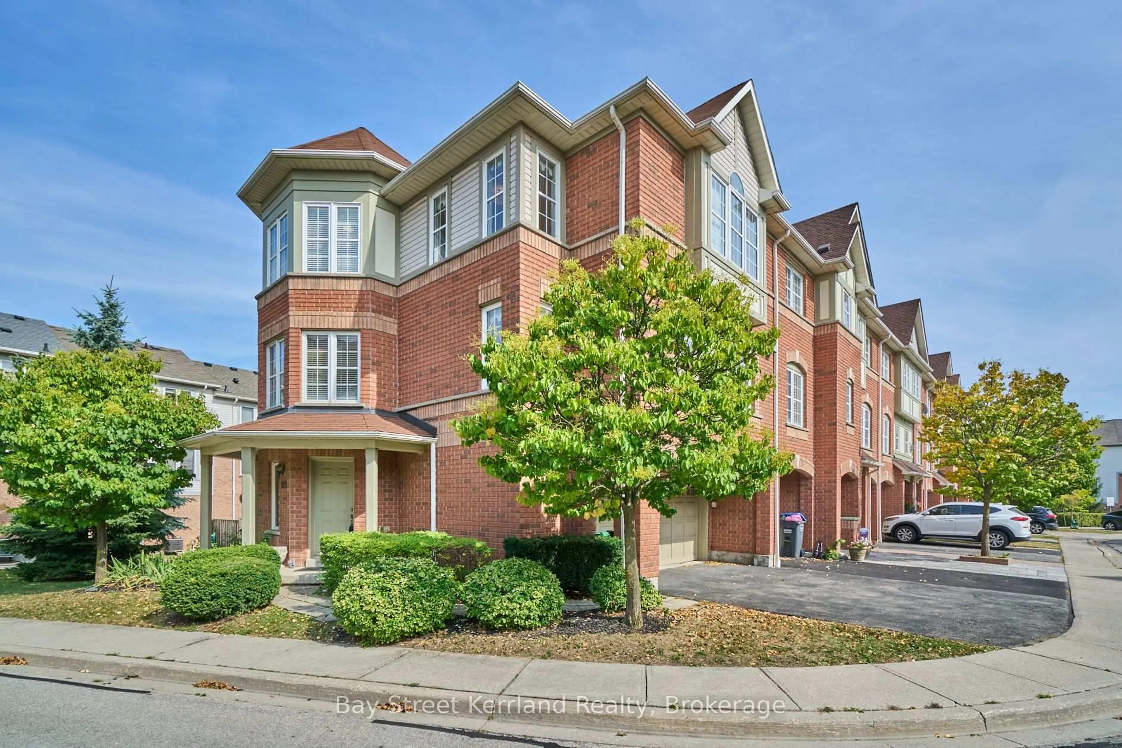 Home with brick exterior material, street for 3030 Breakwater Crt #105, Mississauga Ontario L5B 4N9