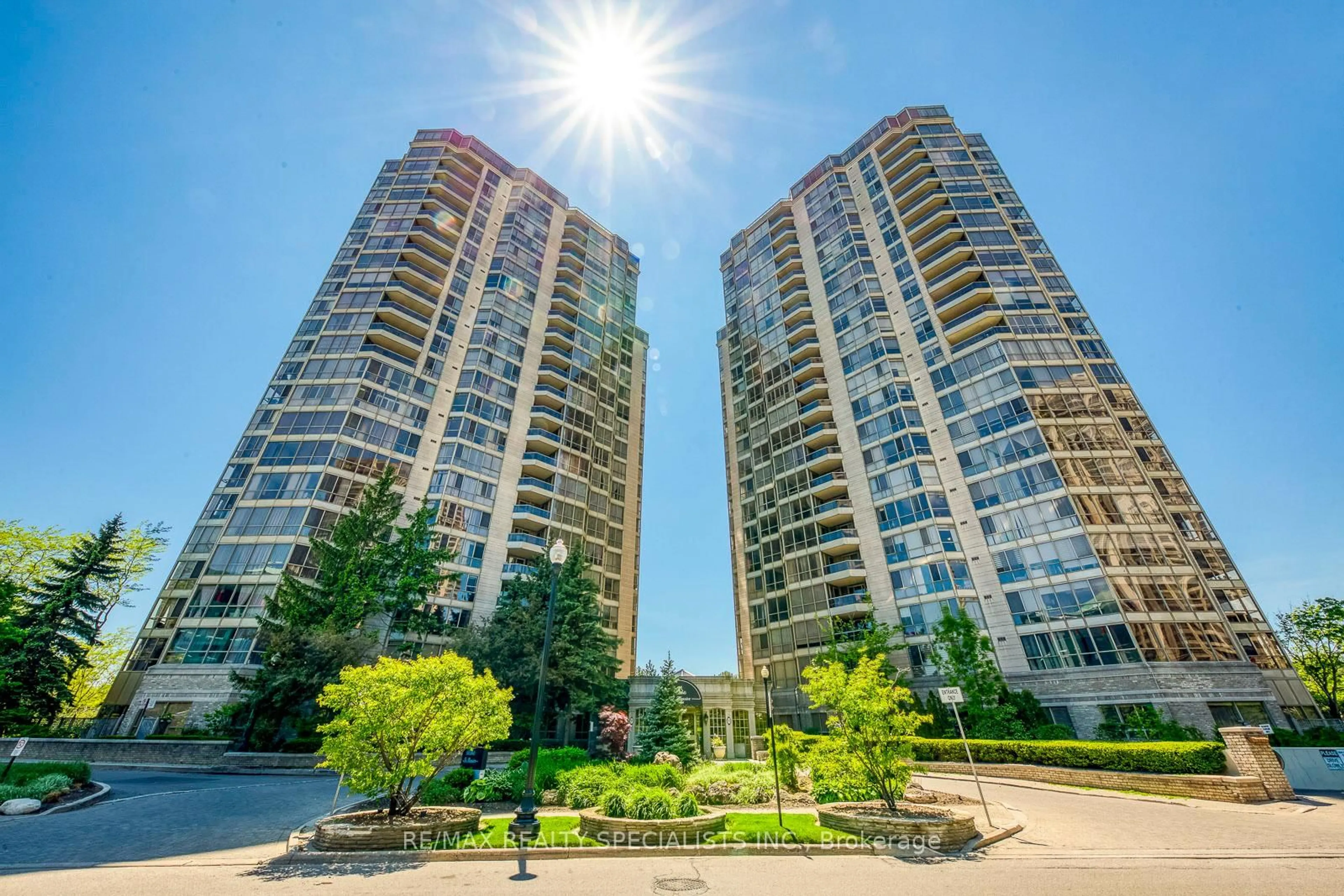 A pic from outside/outdoor area/front of a property/back of a property/a pic from drone, city buildings view from balcony for 55 Kingsbridge Garden Circ #302, Mississauga Ontario L5R 1Y1