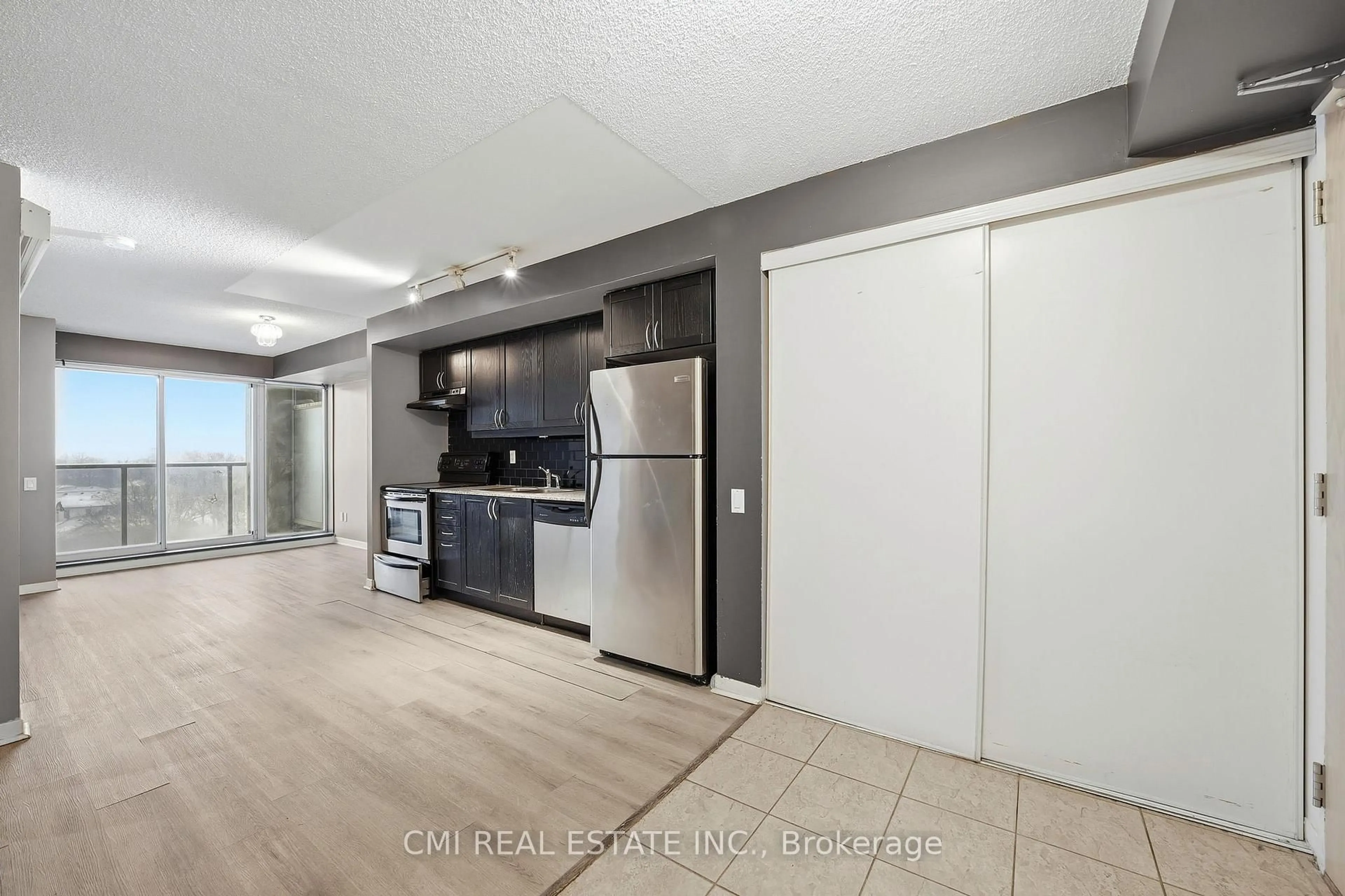 Open concept kitchen, unknown for 1050 The Queens Way #615, Toronto Ontario M8Z 0A8
