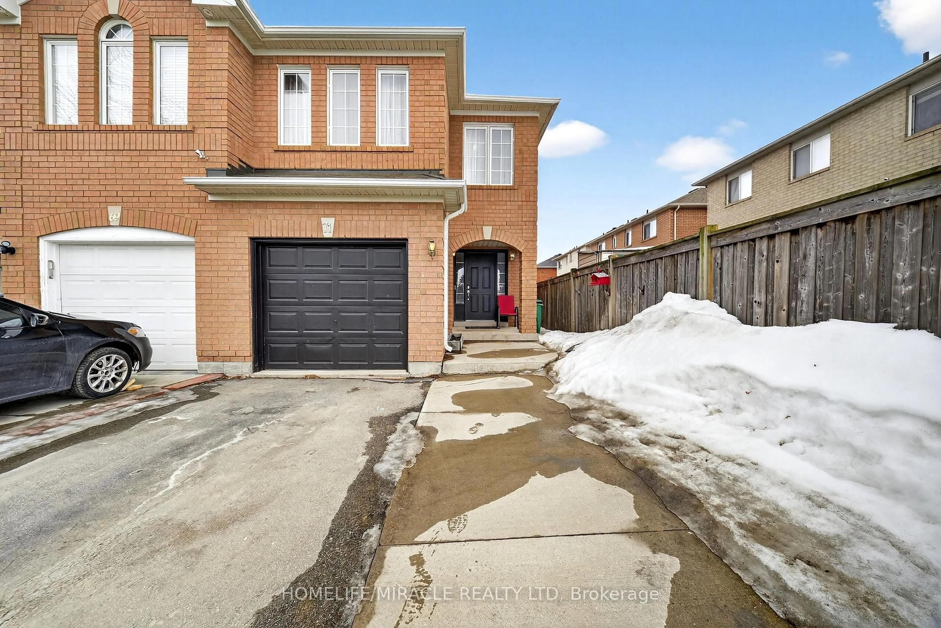 Home with brick exterior material, street for 71 Roadmaster Lane, Brampton Ontario L7A 3A7