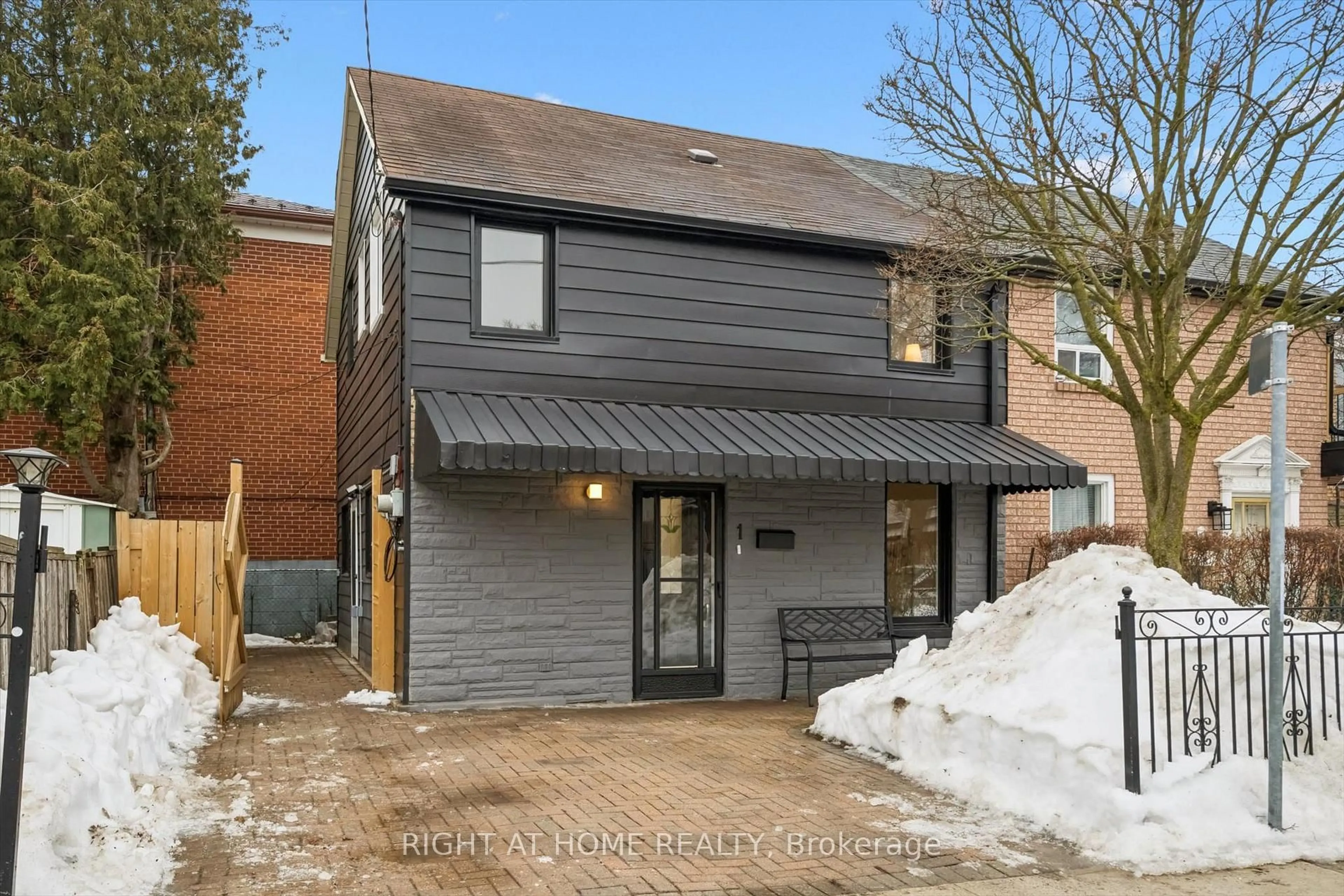 Home with brick exterior material, street for 1 Auburn Ave, Toronto Ontario M6H 2L6