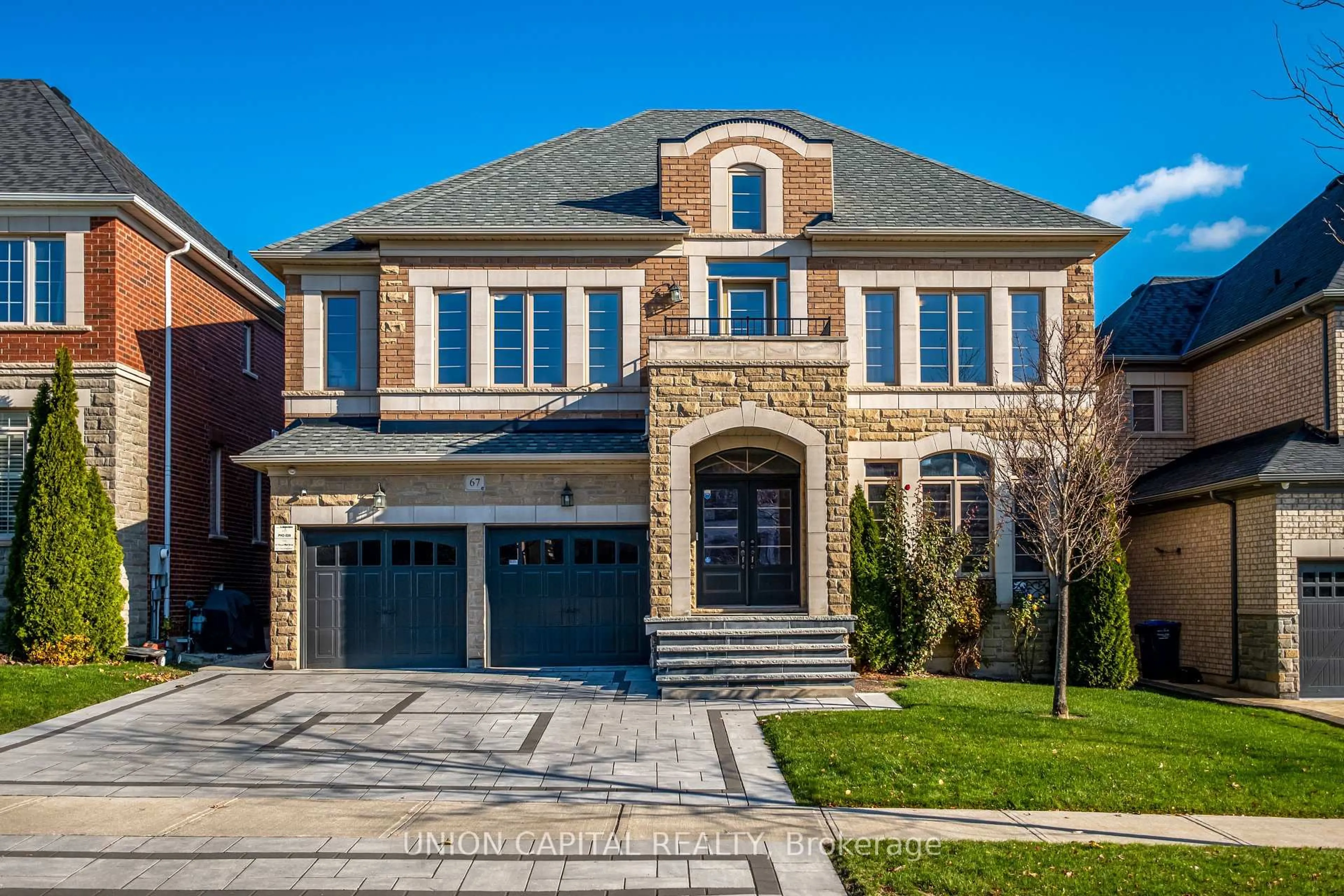 Home with brick exterior material, street for 67 Royal West Dr, Brampton Ontario L6X 0Z8