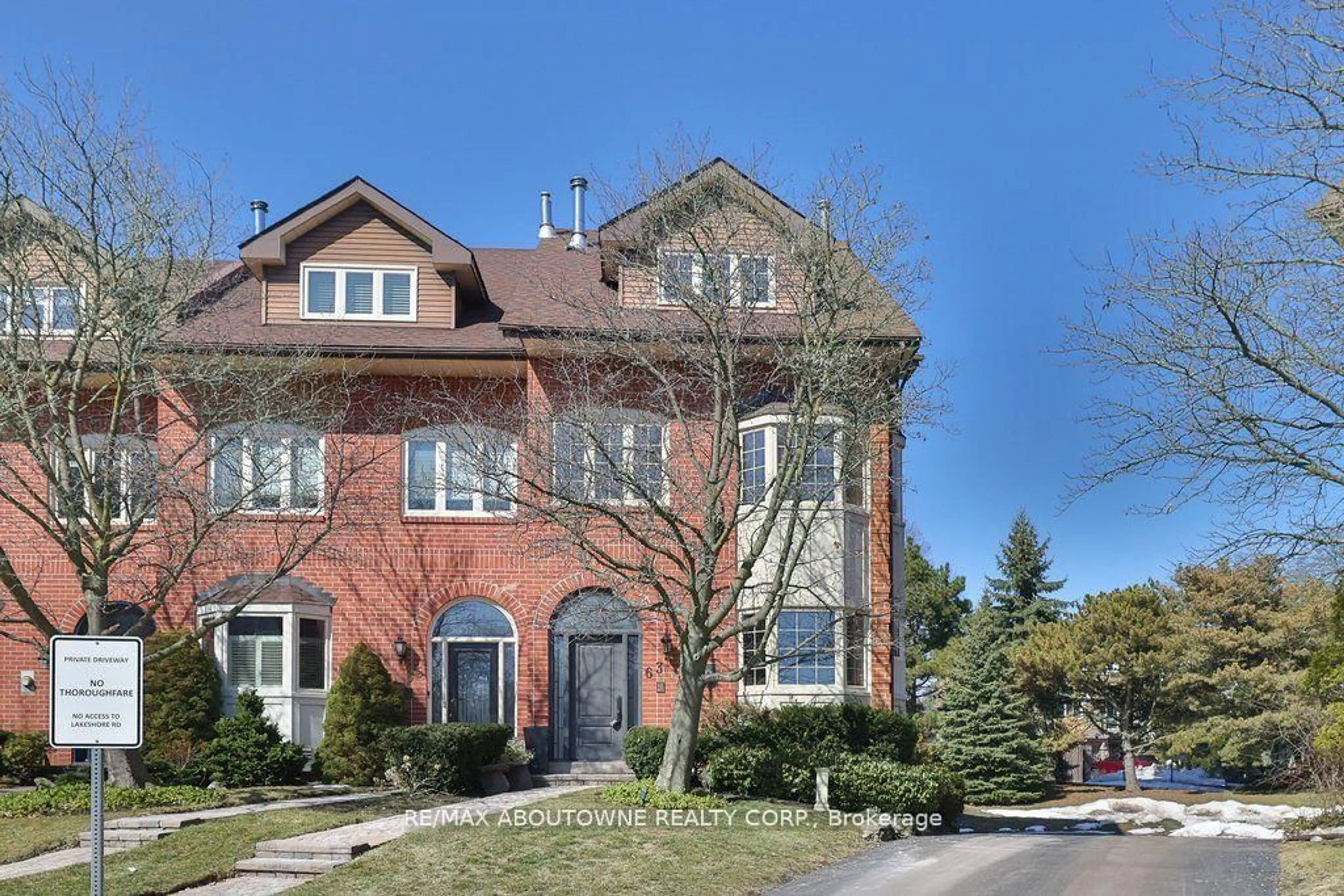 Home with brick exterior material, street for 63 TRADEWIND Dr, Oakville Ontario L6L 6K8