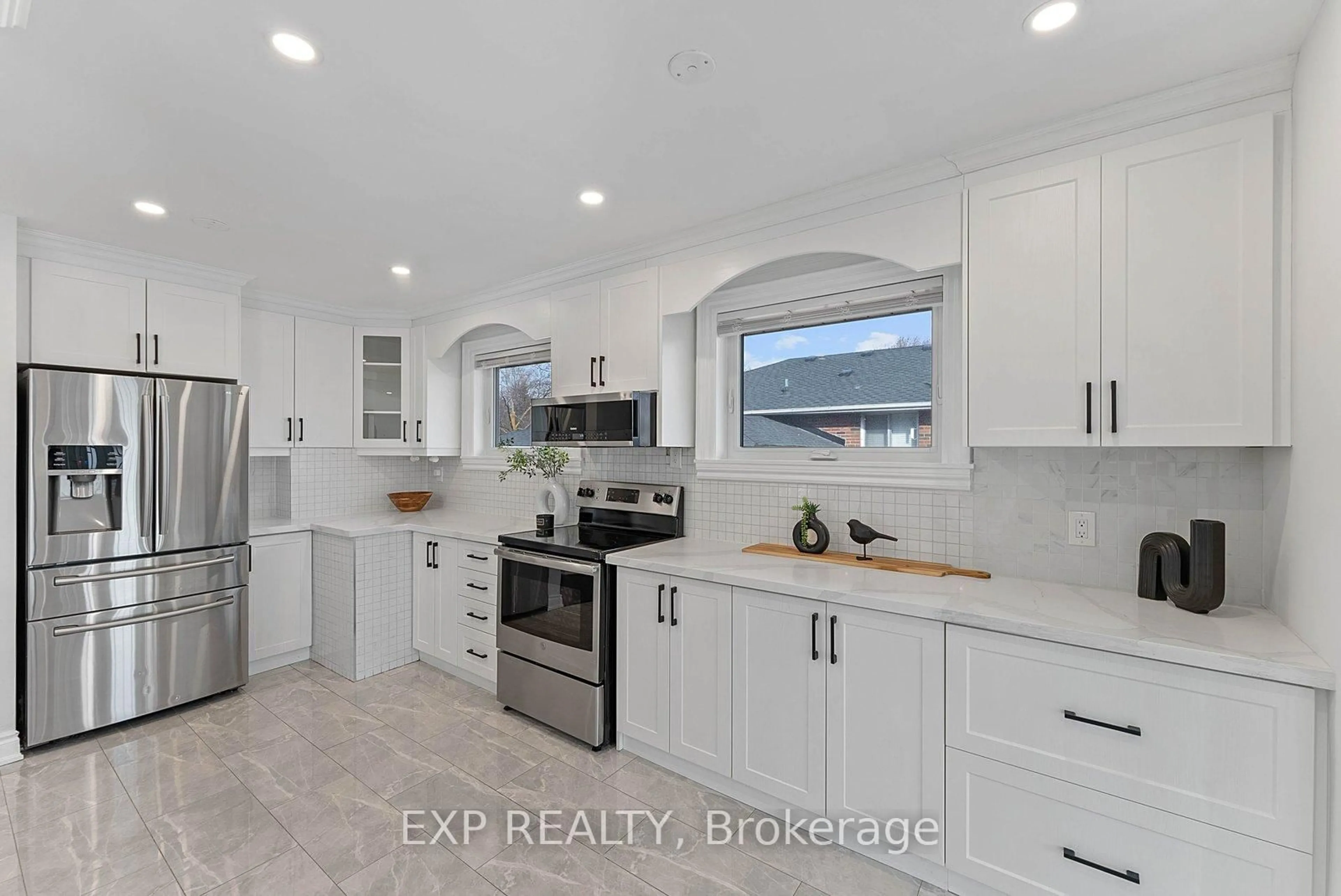 Open concept kitchen, ceramic/tile floor for 39 Hobden Pl, Toronto Ontario M9R 3R6