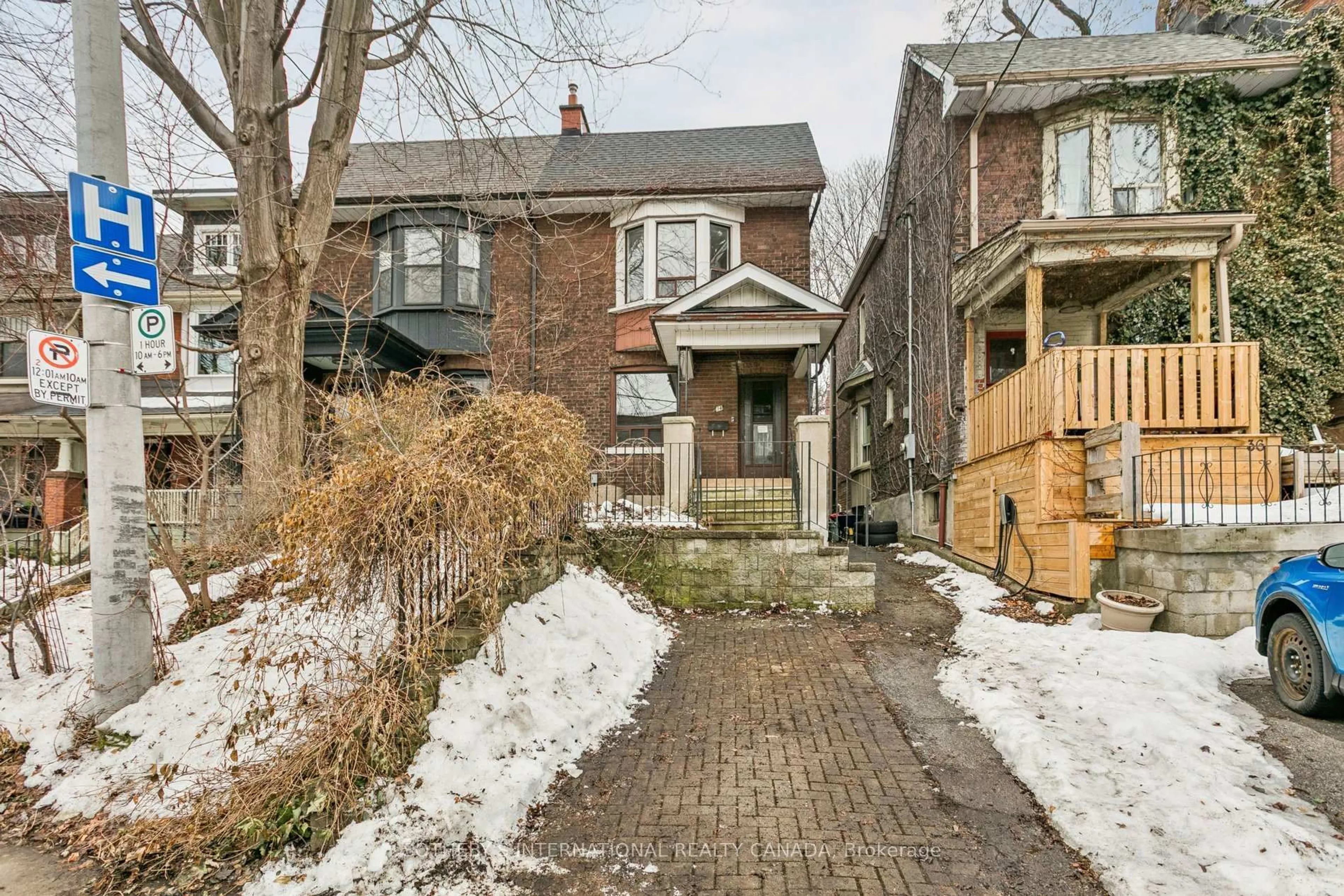 Home with brick exterior material, street for 34 Indian Rd, Toronto Ontario M6R 2T9