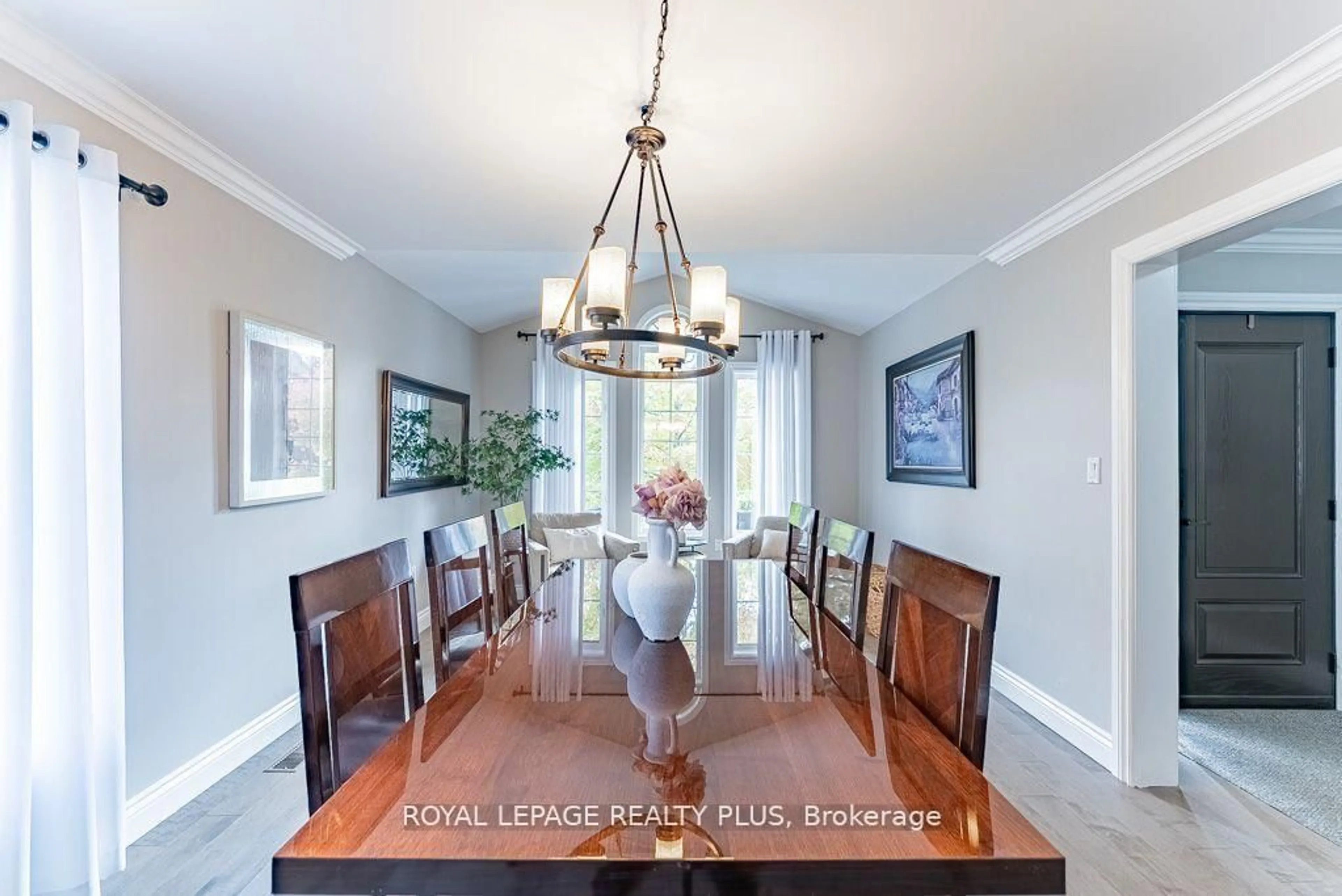 Dining room, wood/laminate floor for 20 Navy Cres, Brampton Ontario L7A 1P3