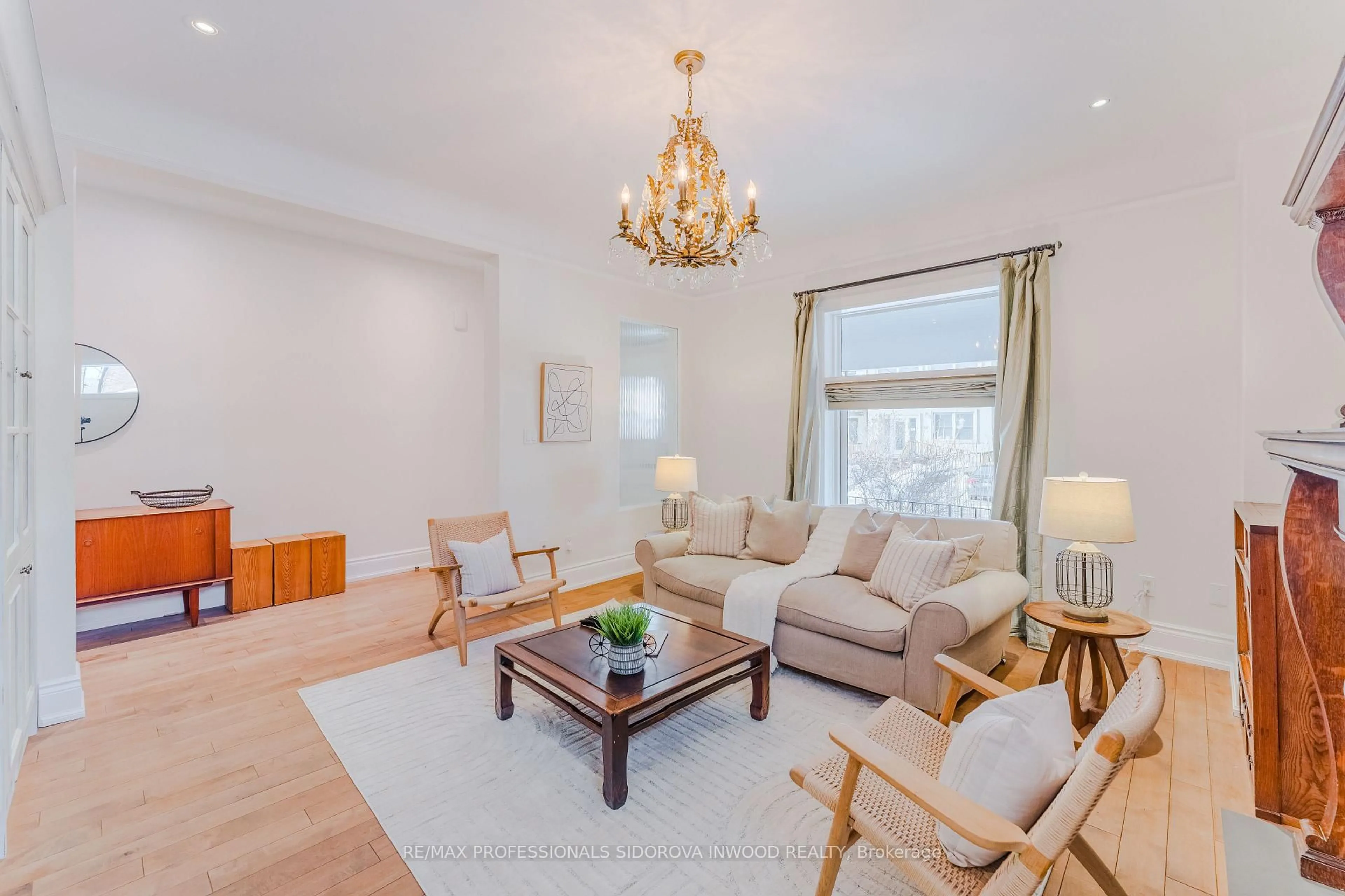 Living room with furniture, wood/laminate floor for 51 Harvard Ave, Toronto Ontario M6R 1C7