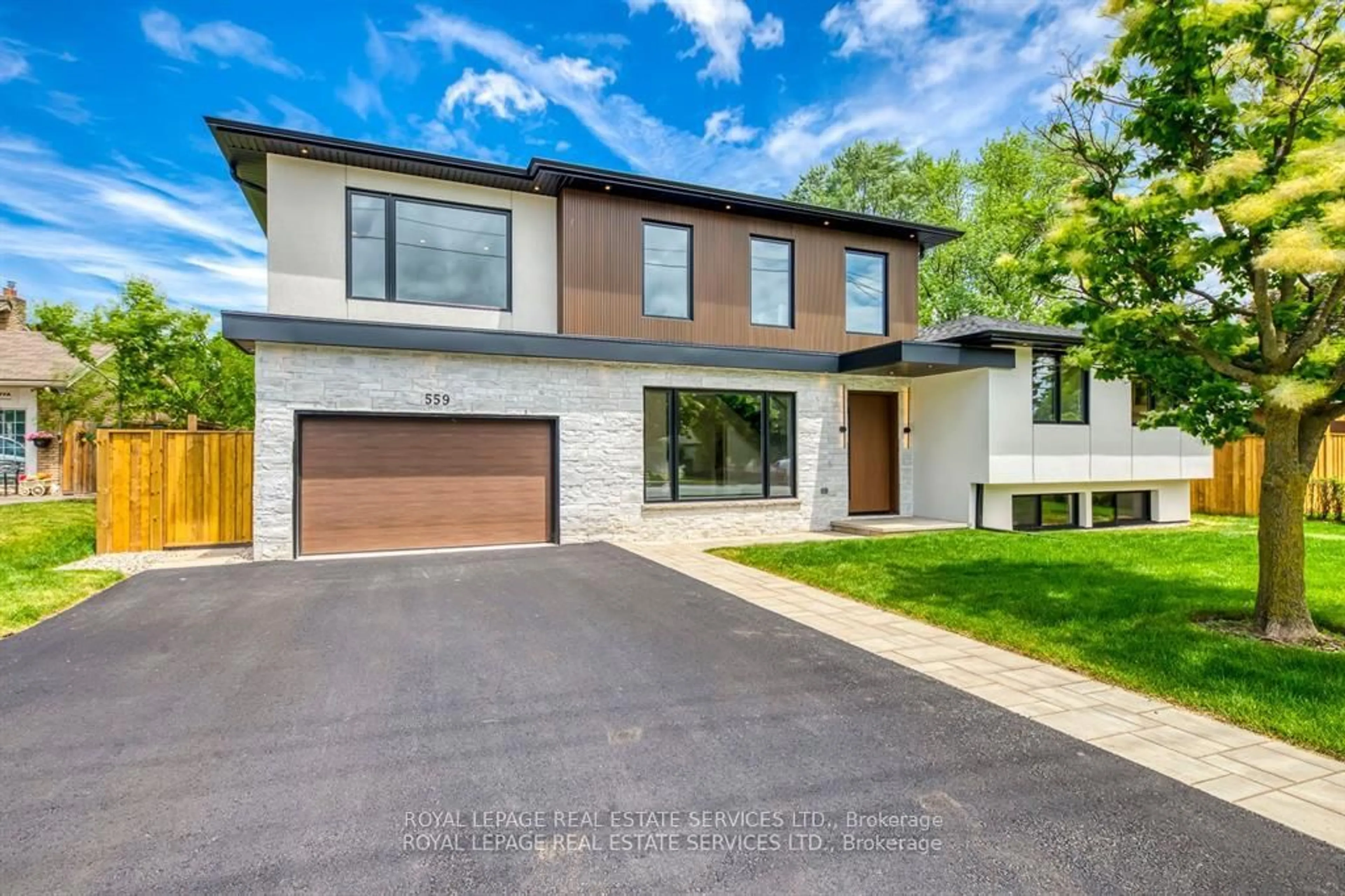 Home with brick exterior material, street for 559 Walkers Line, Burlington Ontario L7N 2E4