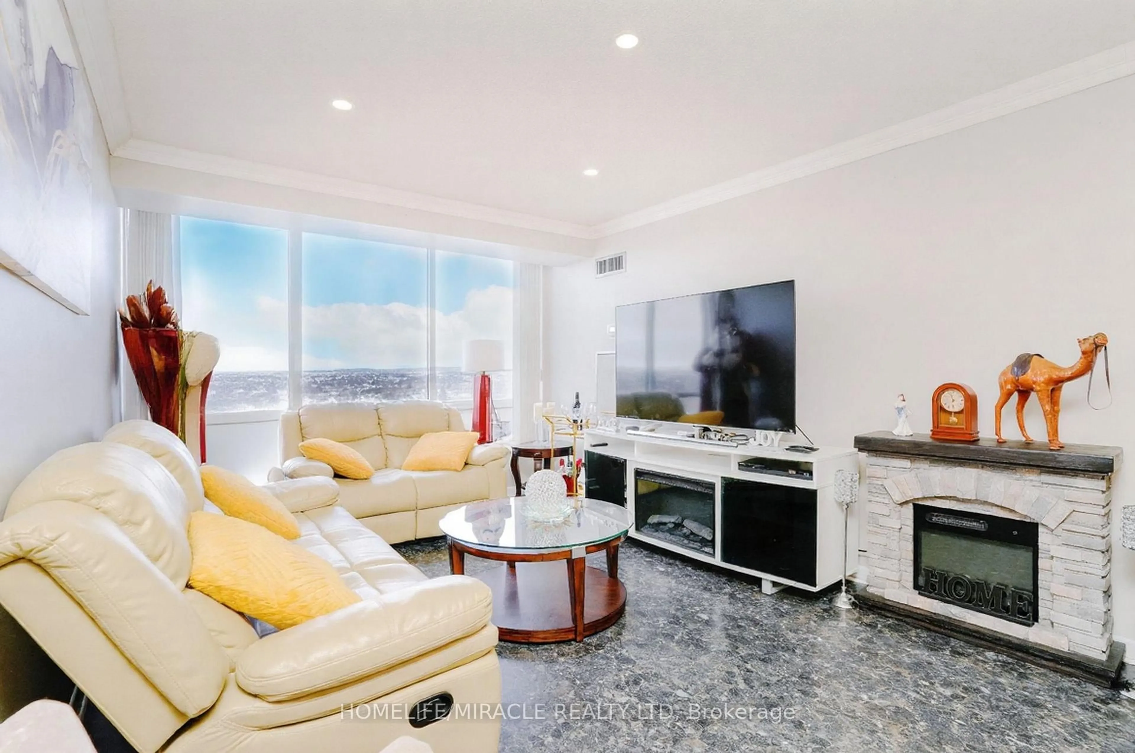 Living room with furniture, unknown for 26 Hanover Rd #1705, Brampton Ontario L6S 4T2