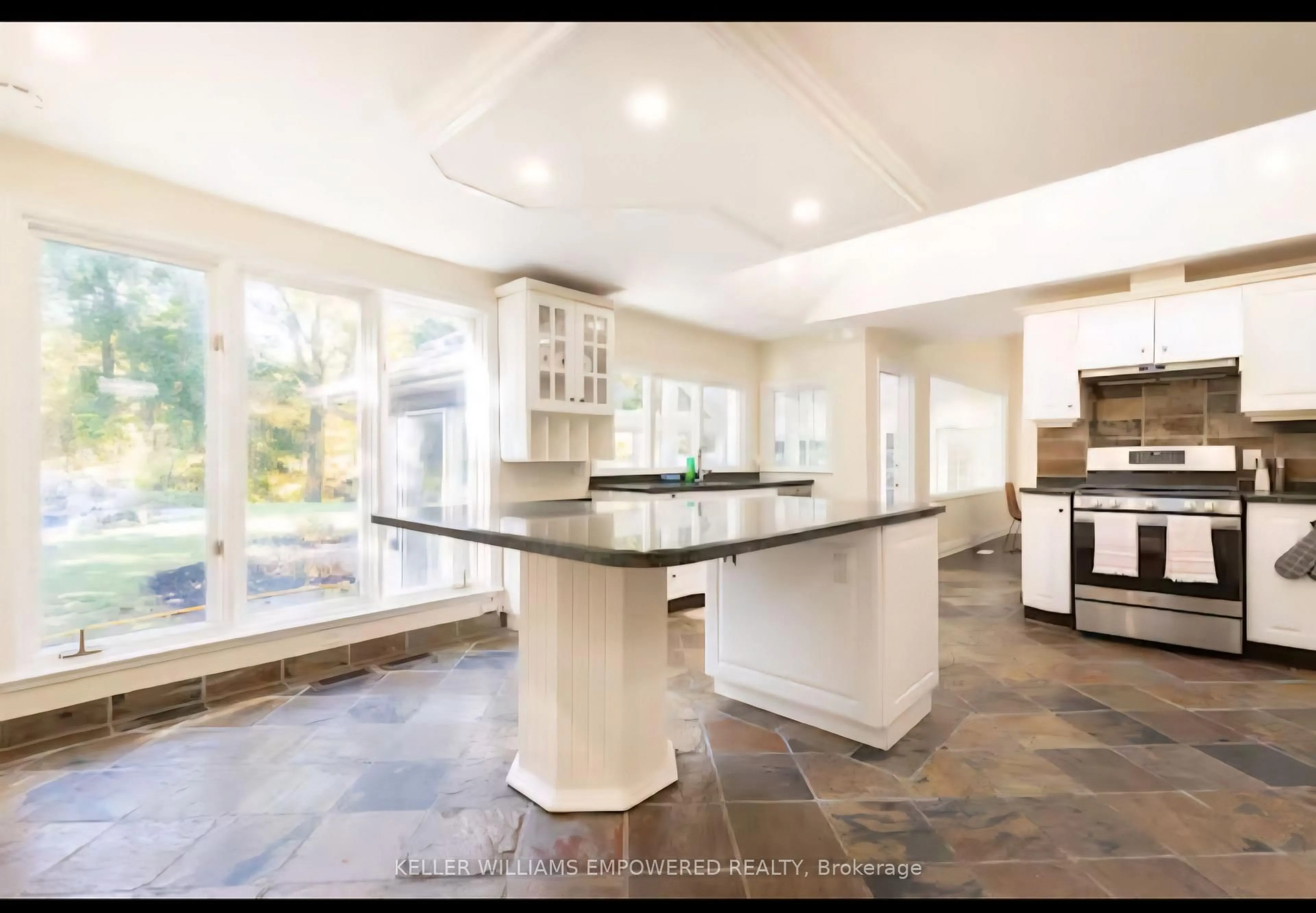 Open concept kitchen, ceramic/tile floor for 876 Parkland Ave, Mississauga Ontario L5H 3H1