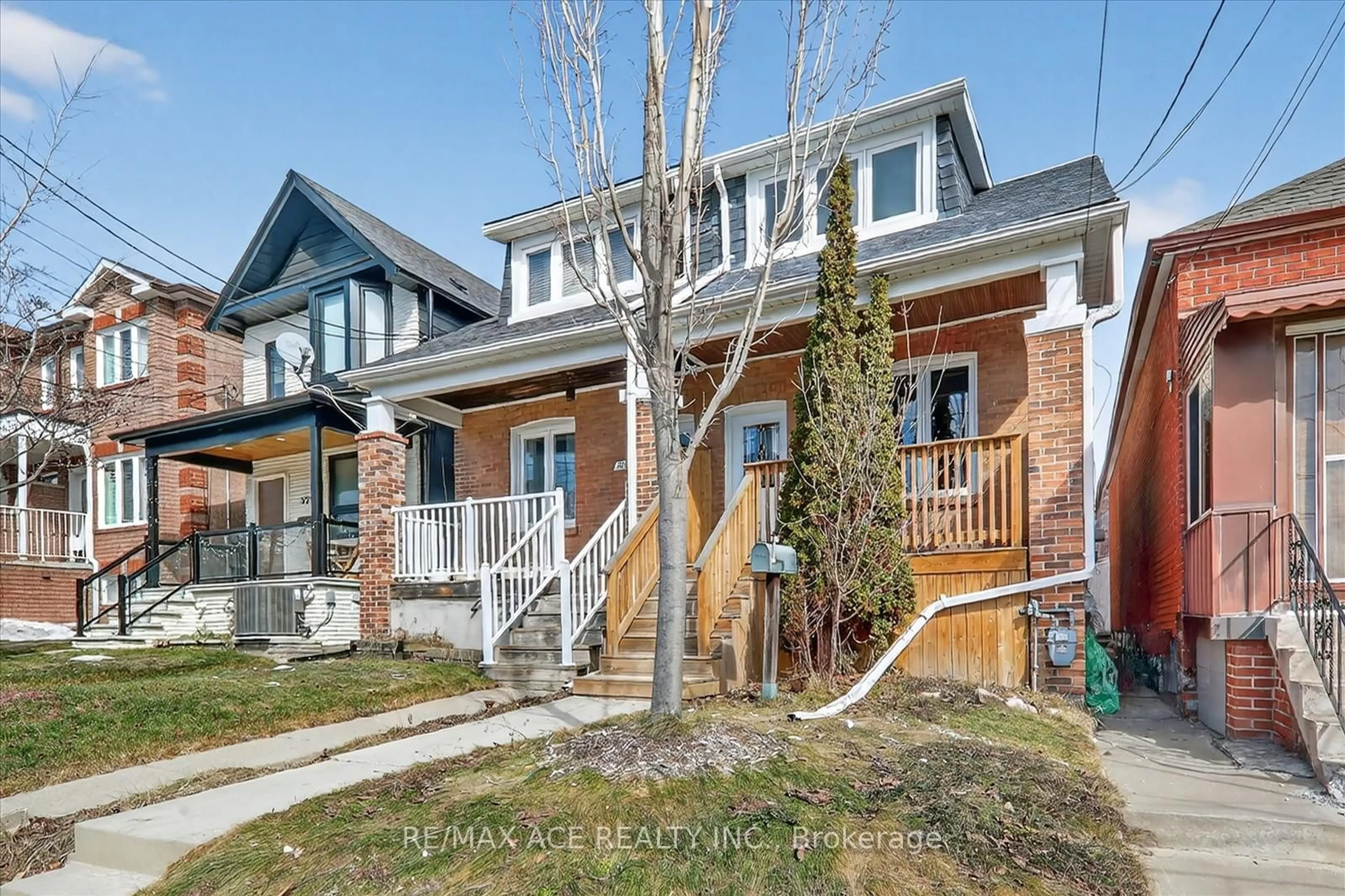 Home with brick exterior material, street for 325 Boon Ave, Toronto Ontario M6E 4A4