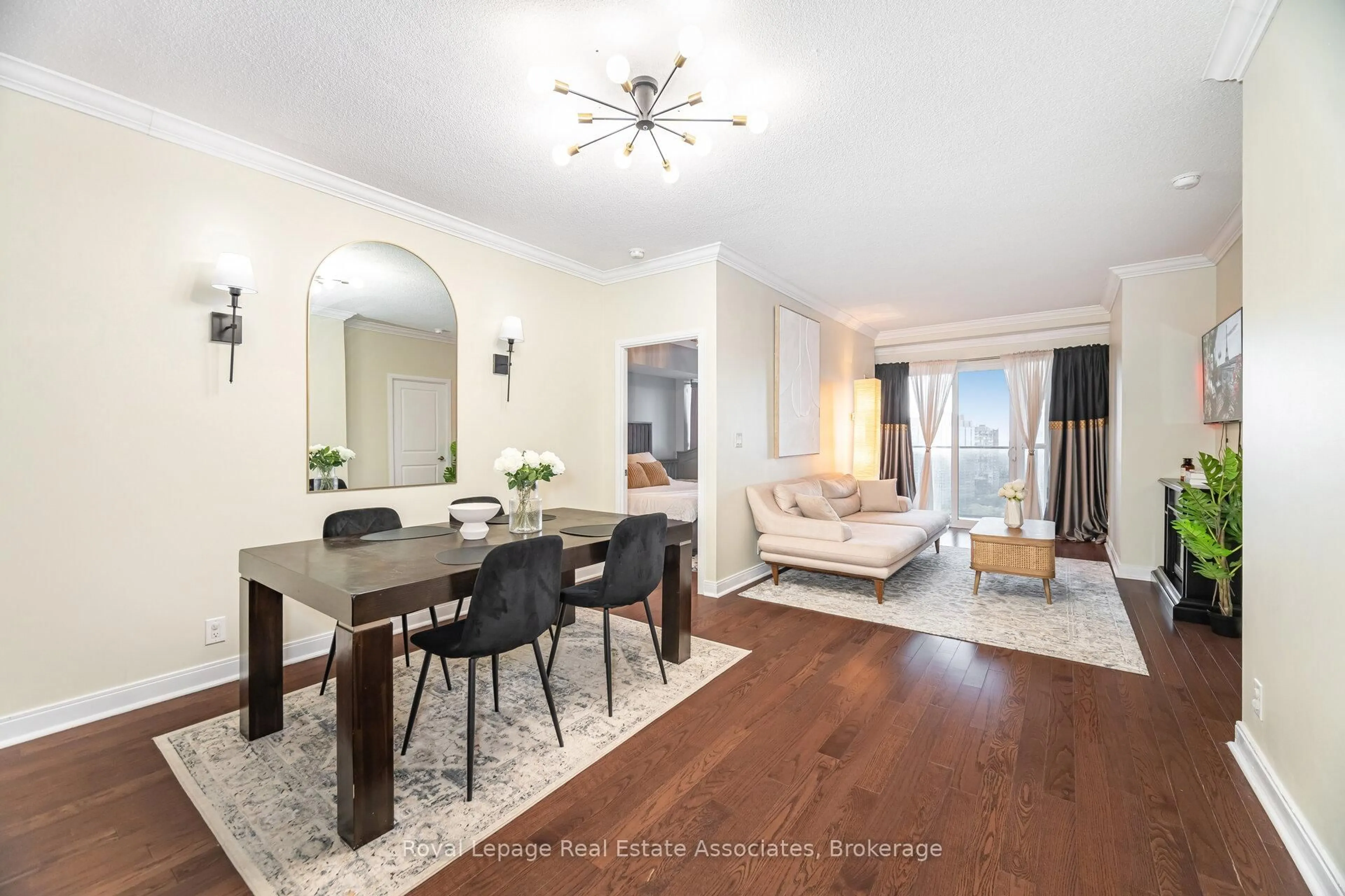 Living room with furniture, wood/laminate floor for 60 Absolute Ave #1907, Mississauga Ontario L4Z 0A9