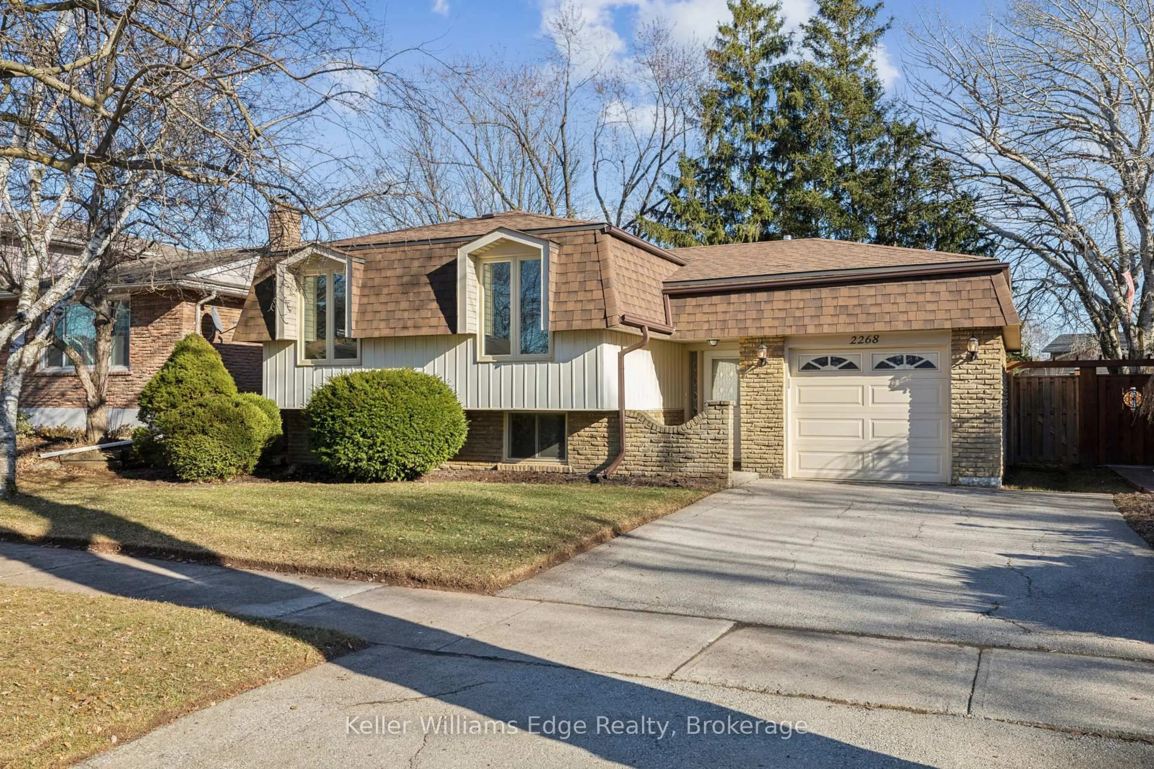 Home with brick exterior material, street for 2268 Wyandotte Dr, Oakville Ontario L6L 2T5
