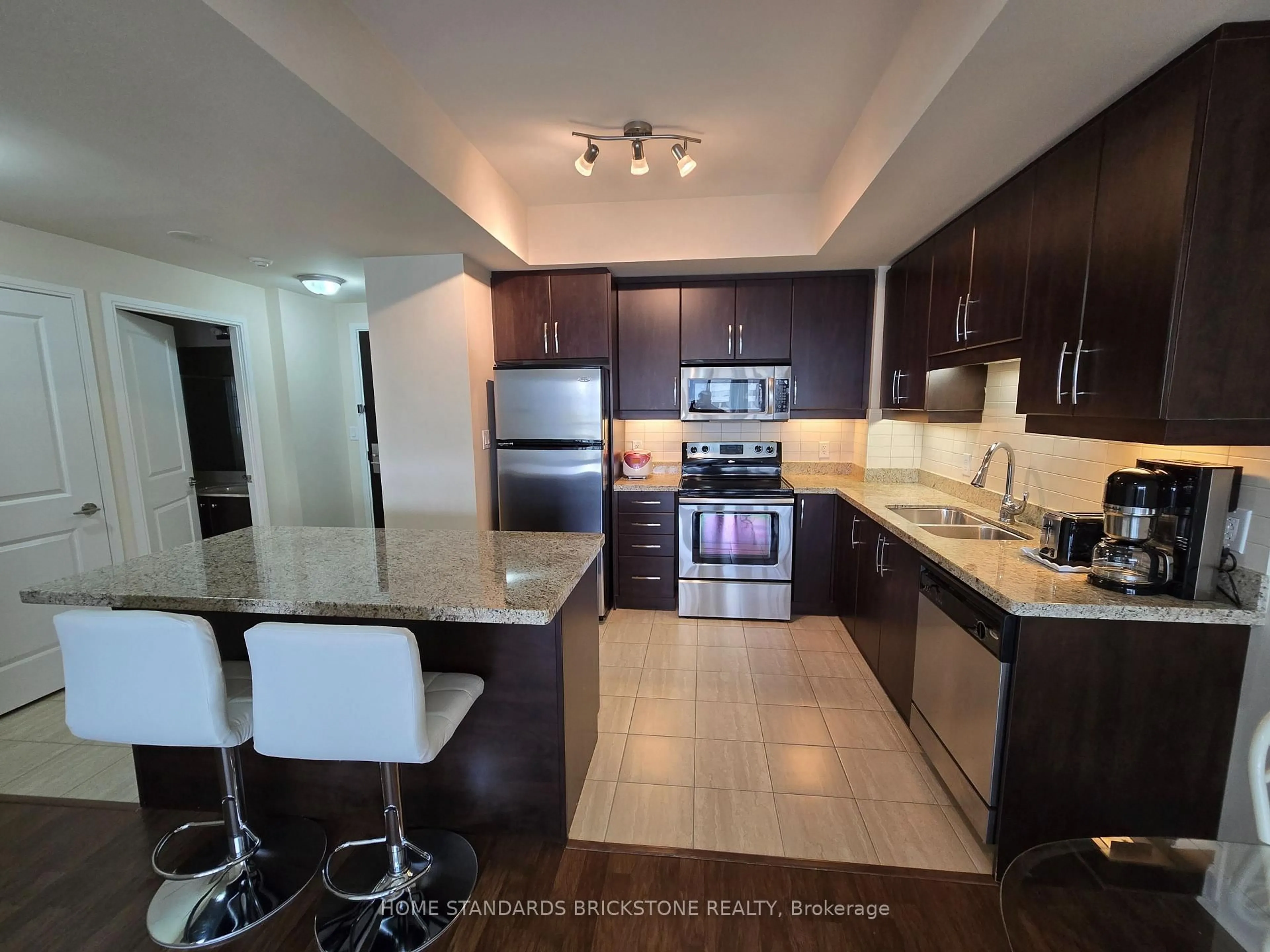Open concept kitchen, ceramic/tile floor for 50 Absolute Ave #1106, Mississauga Ontario L4Z 0A8