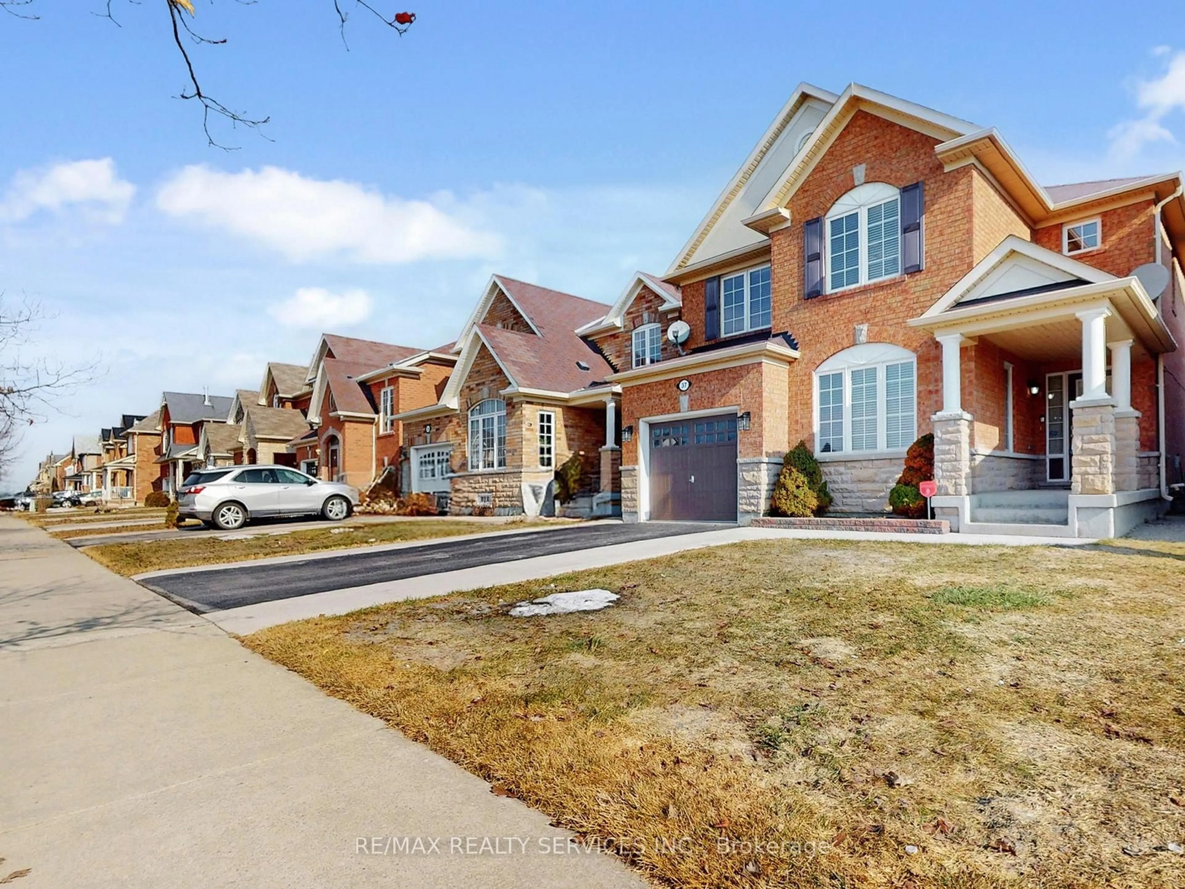 Home with brick exterior material, street for 37 Bloom Dr, Brampton Ontario L6P 3C3