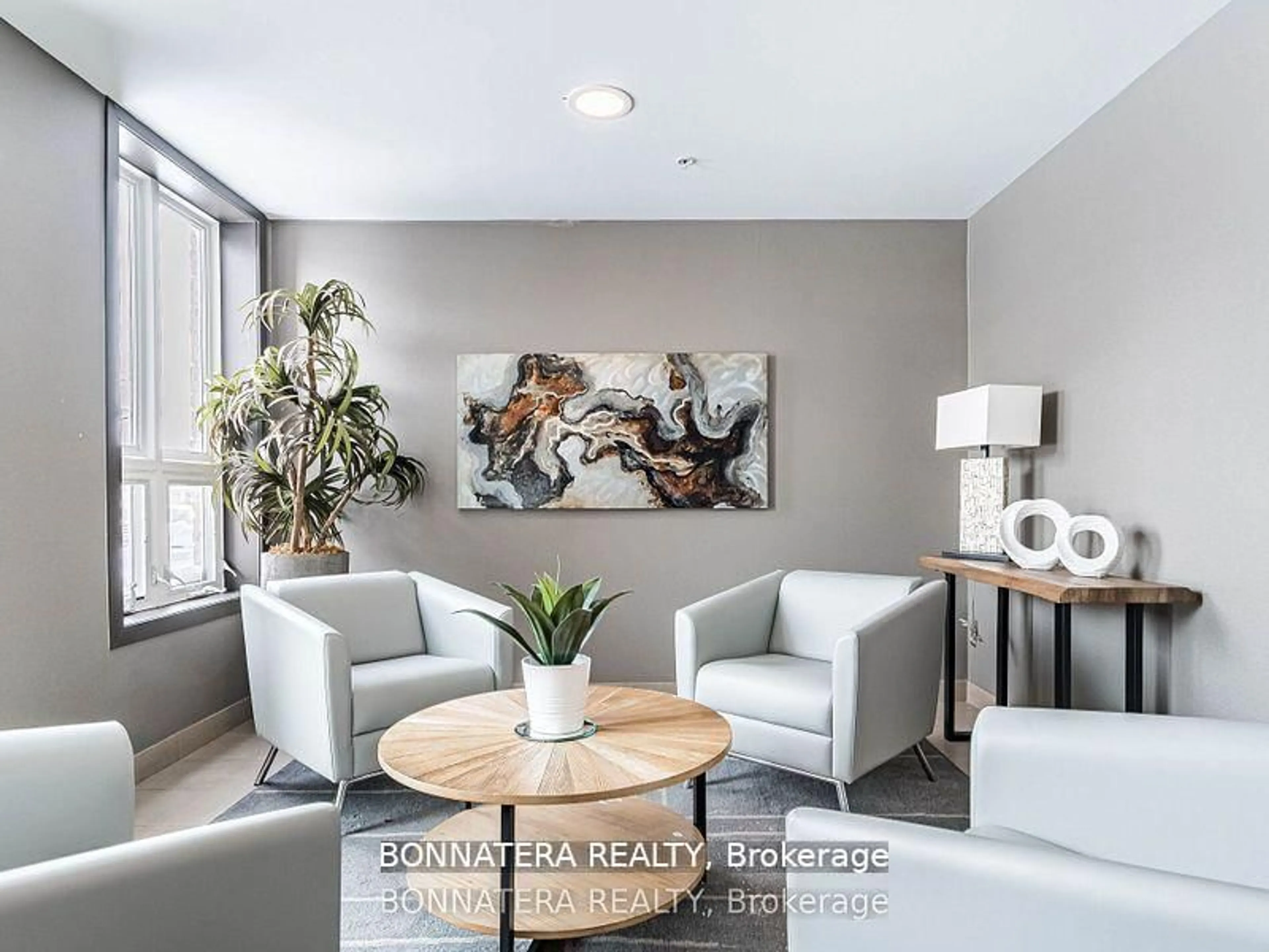 Living room with furniture, wood/laminate floor for 5010 CORPORATE Dr #209, Burlington Ontario L7L 0H6