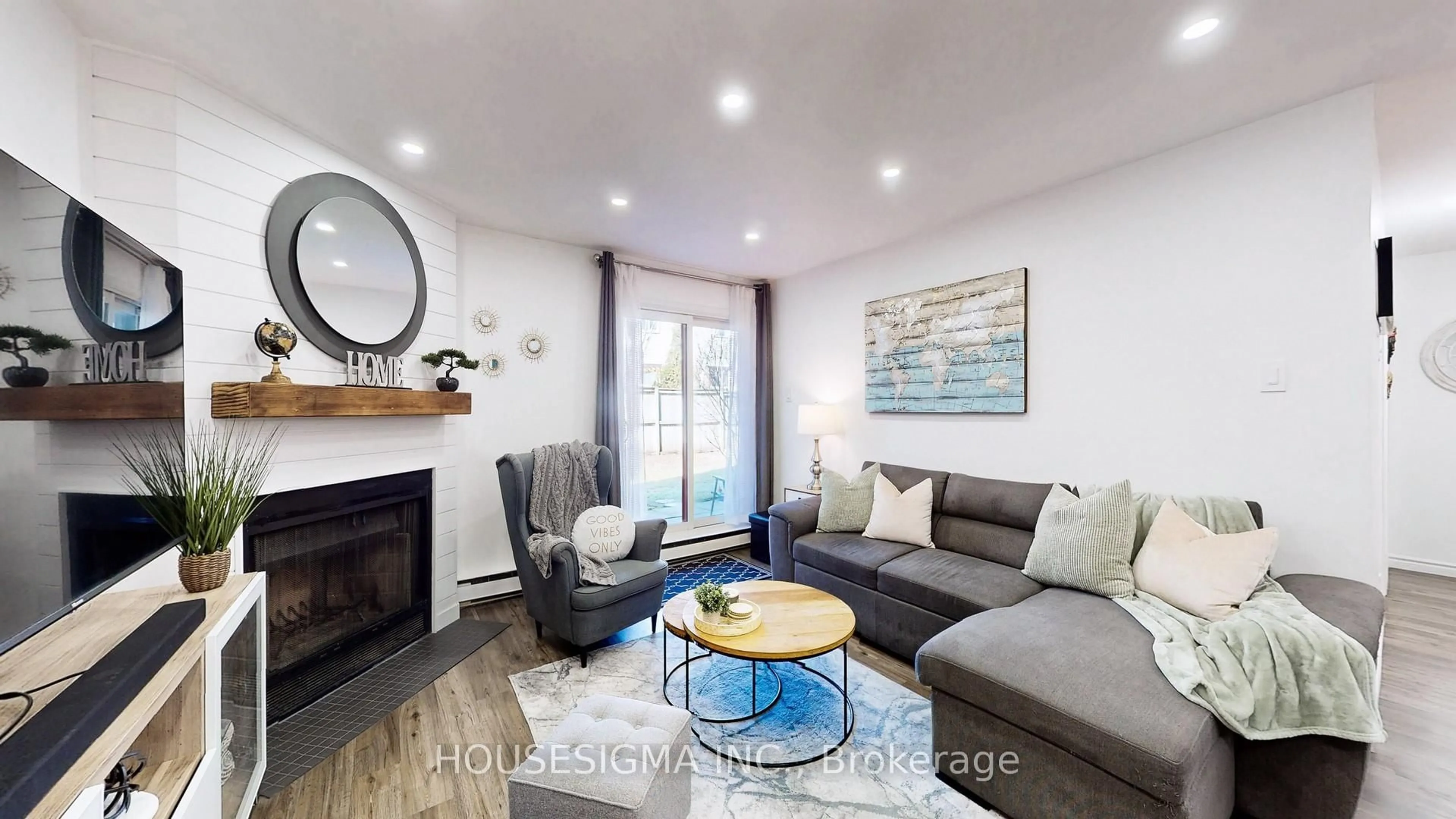 Living room with furniture, wood/laminate floor for 1496 Pilgrims Way #114, Oakville Ontario L6M 3G9