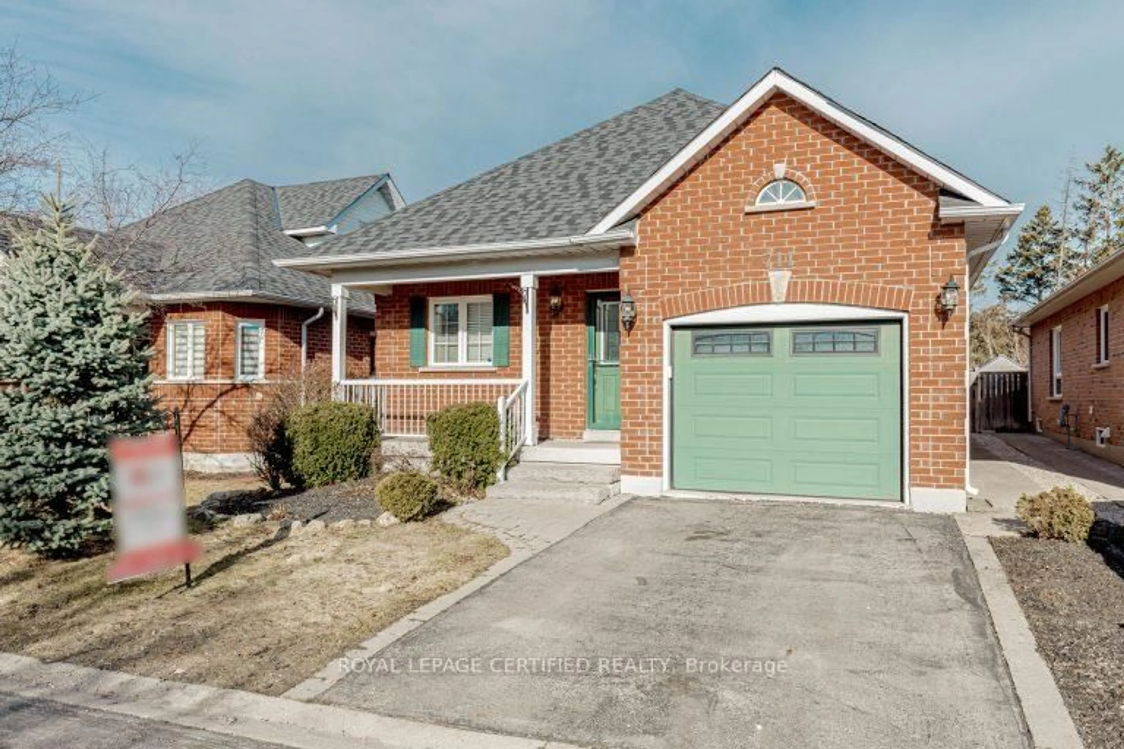 Home with brick exterior material, street for 711 POPLAR Rd, Milton Ontario L9T 5X2