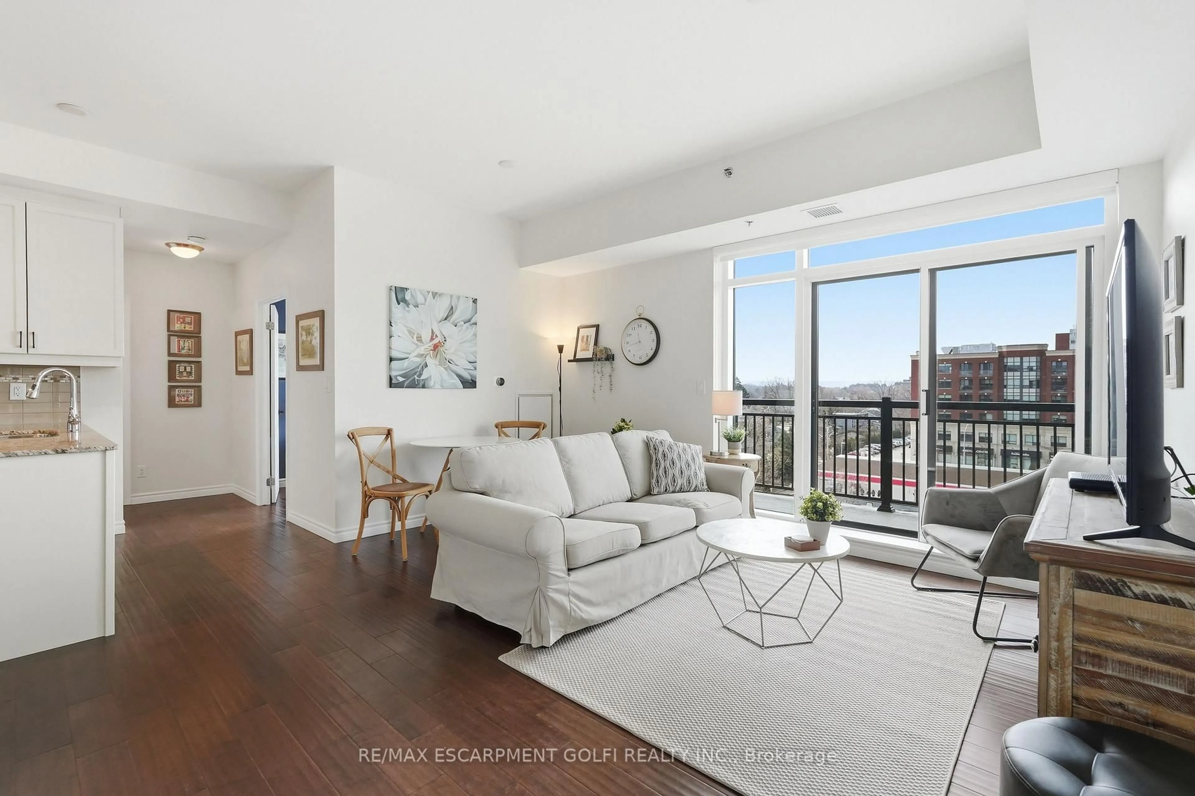 Living room with furniture, unknown for 34 Plains Rd #501, Burlington Ontario L7T 0B9